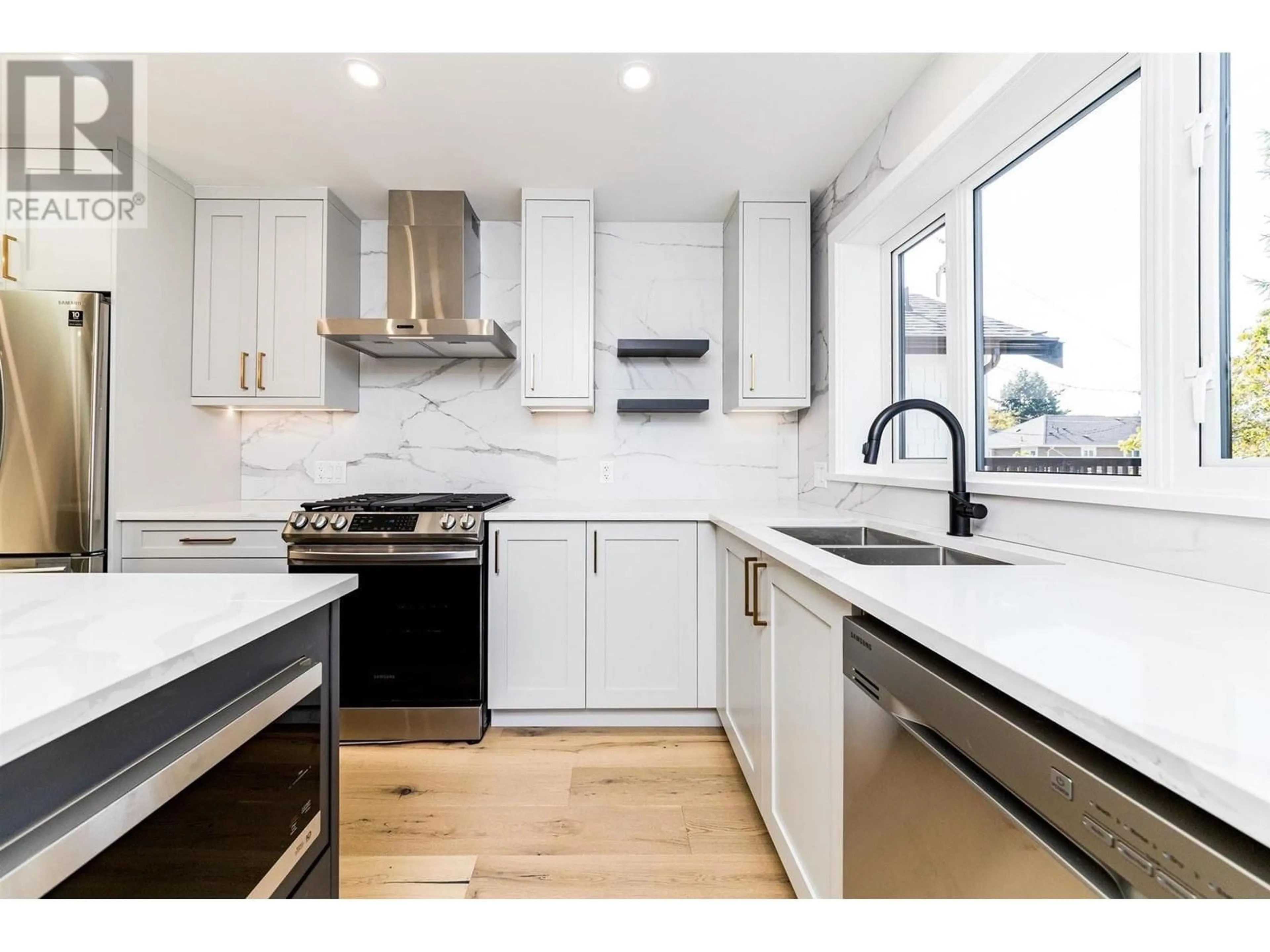 Open concept kitchen for 1 5455 KILLARNEY STREET, Vancouver British Columbia V5R3W3