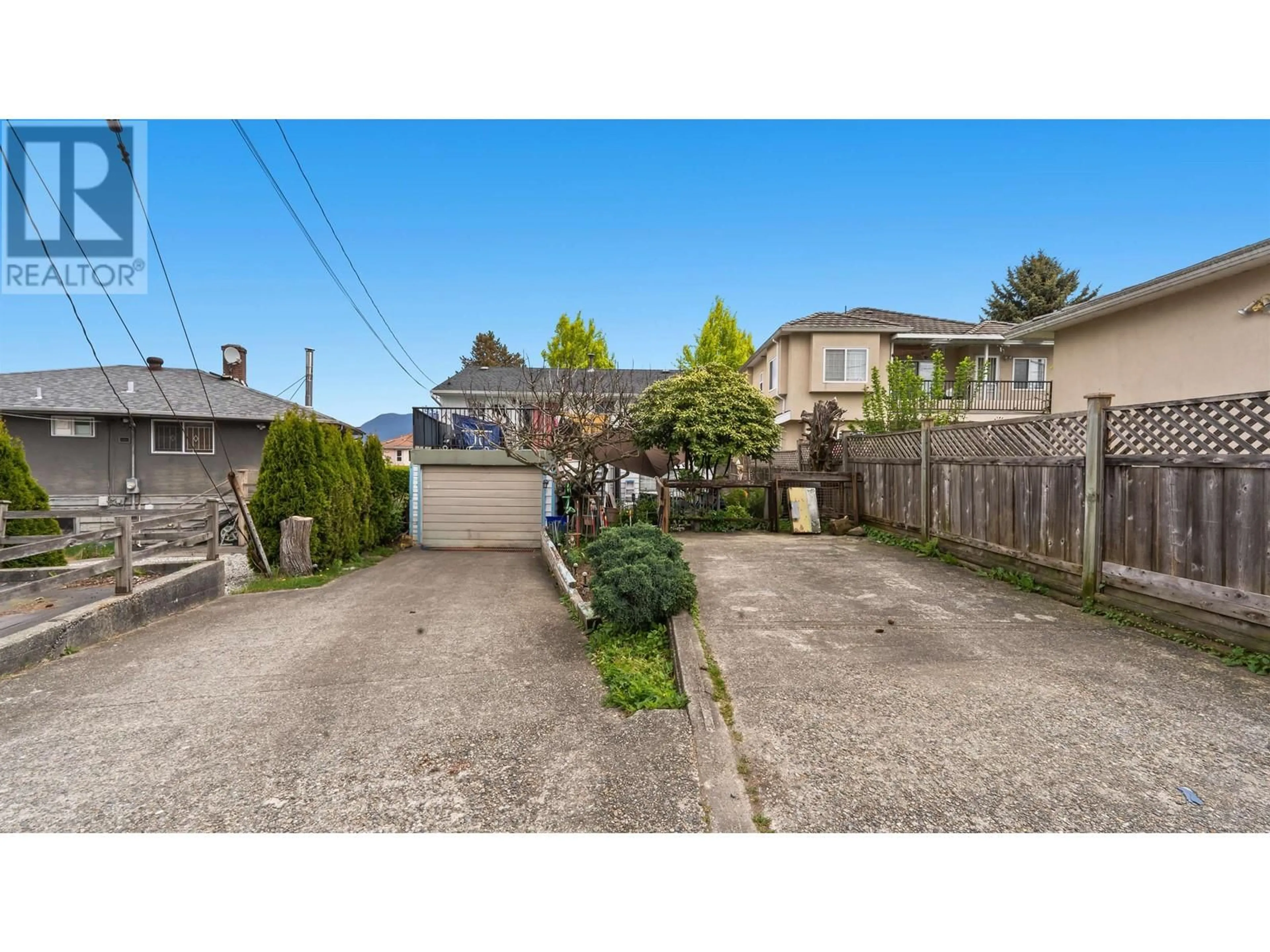 Frontside or backside of a home, the fenced backyard for 3105 DIEPPE DRIVE, Vancouver British Columbia V5M4B2