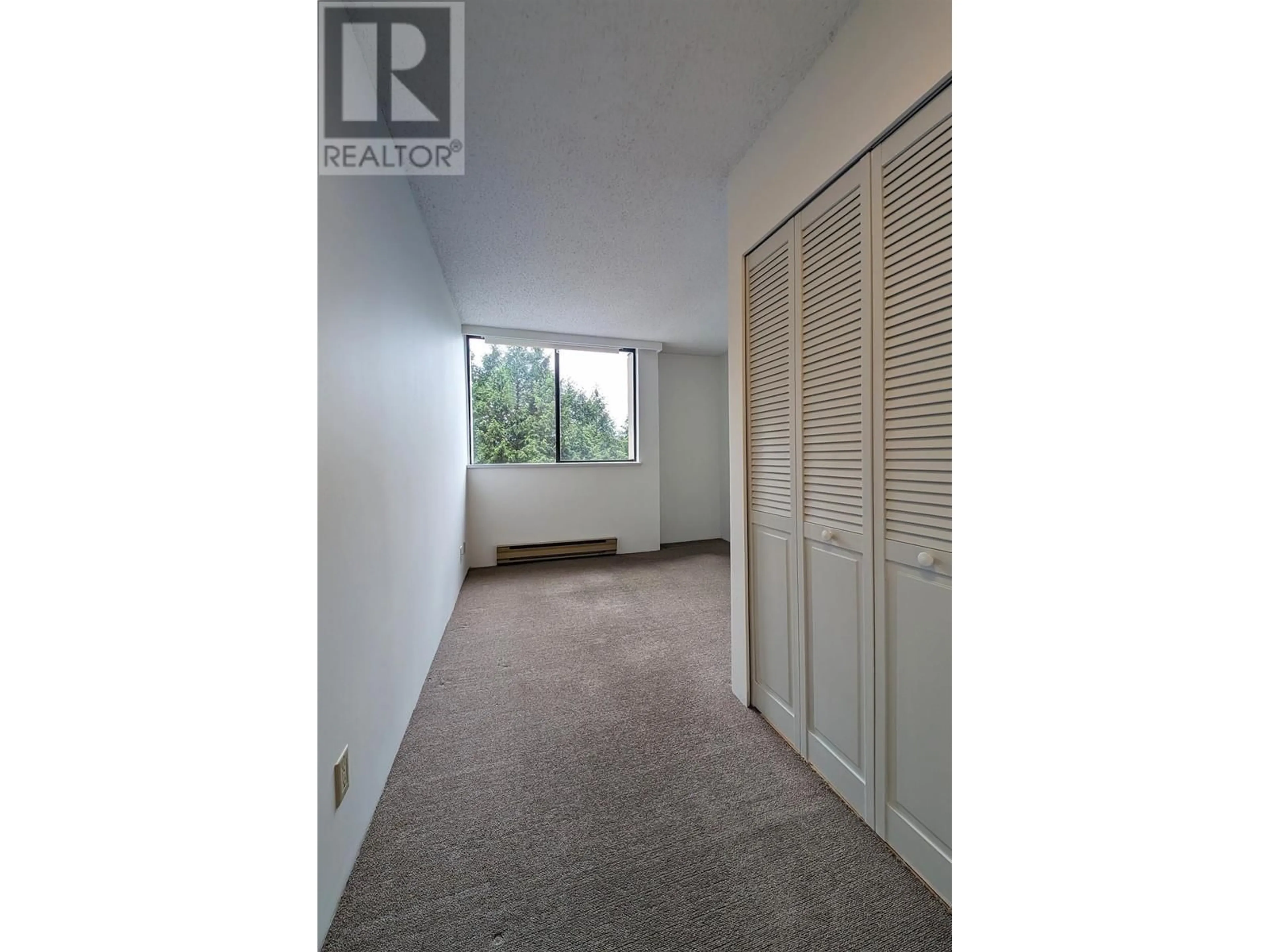 A pic of a room, not visible floor for 506 3970 CARRIGAN COURT, Burnaby British Columbia V3N4S5