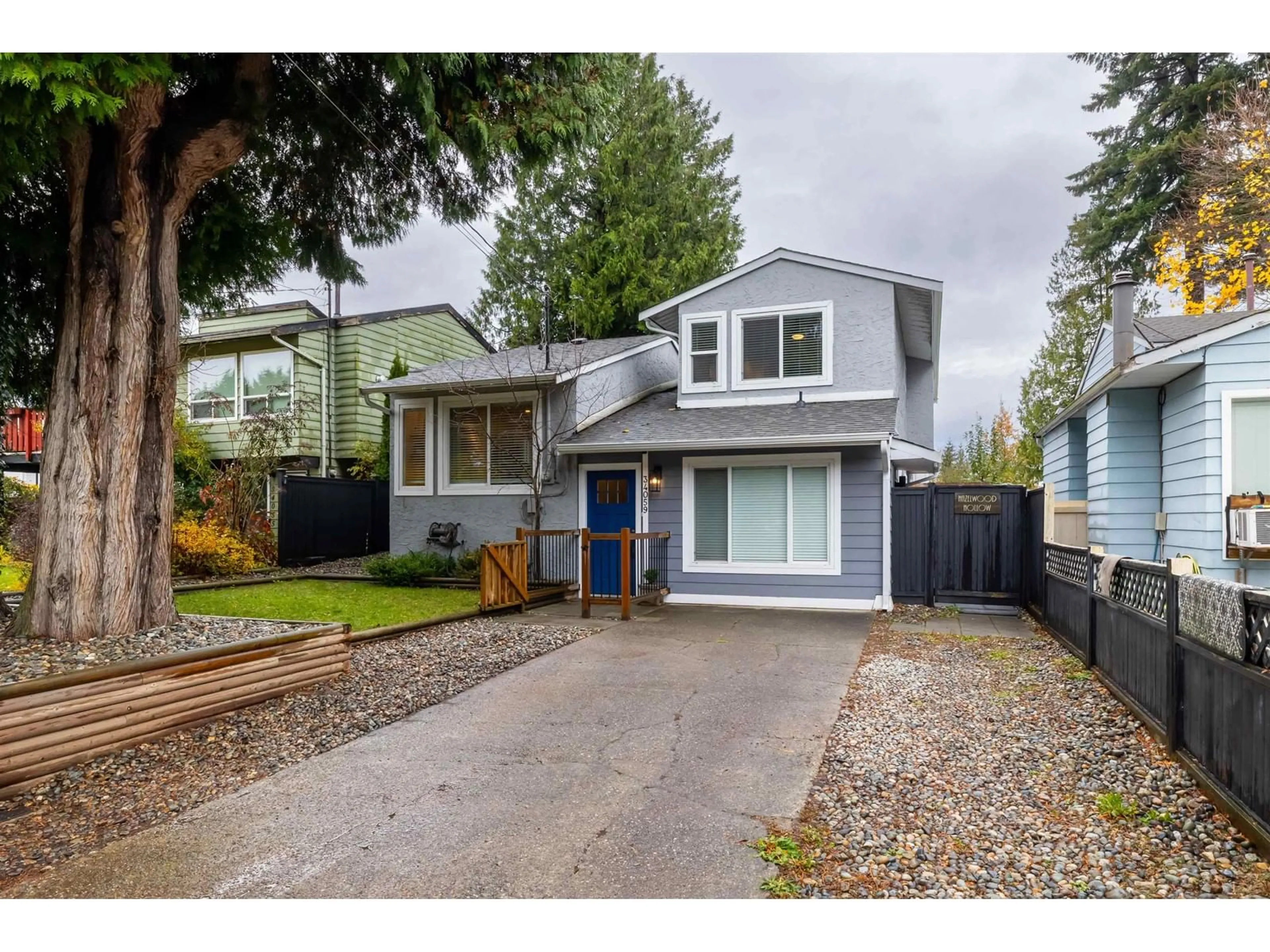 Frontside or backside of a home, the fenced backyard for 34059 HAZELWOOD AVENUE, Abbotsford British Columbia V2S7R1