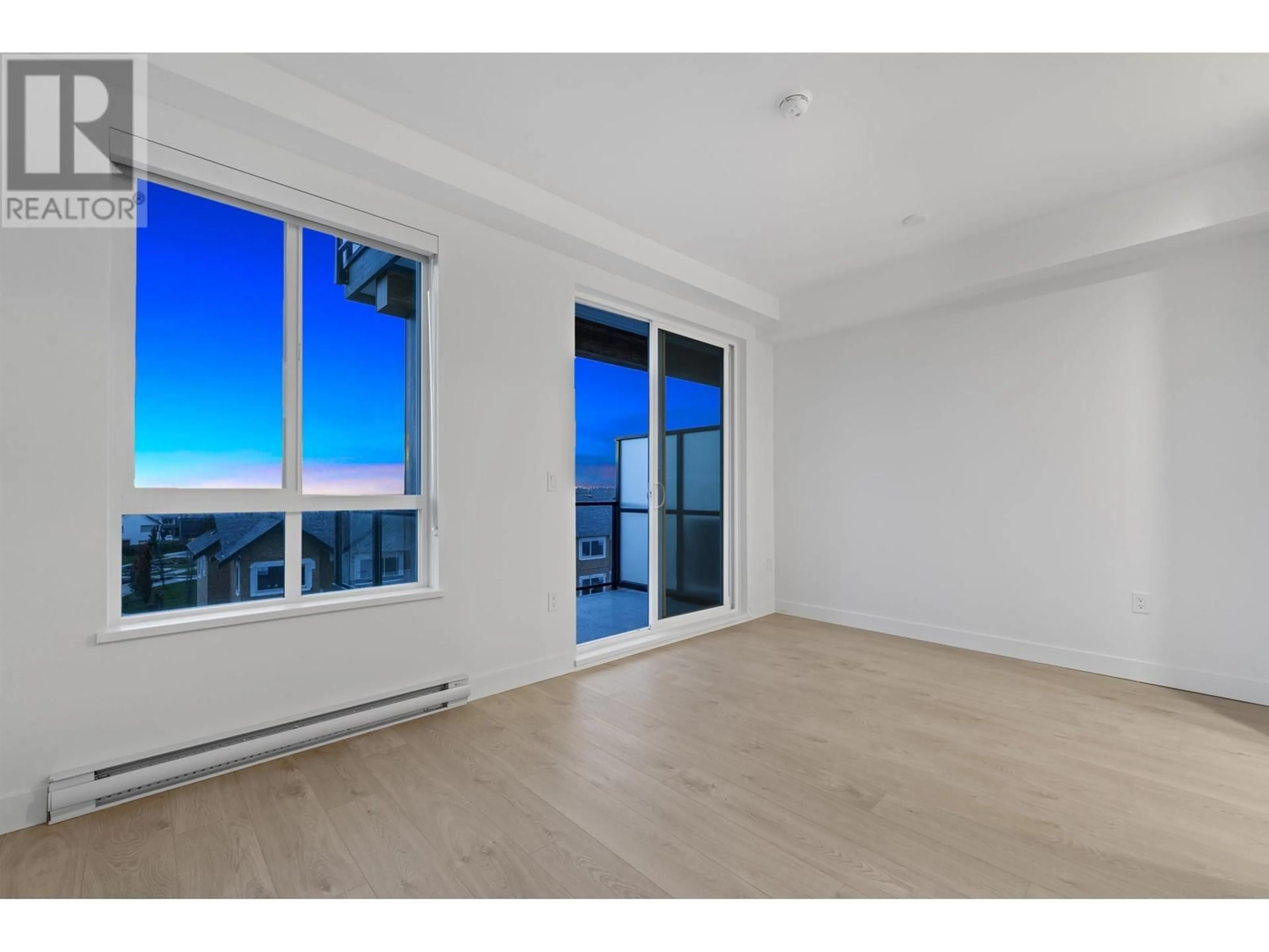 A pic of a room, wood floors for 410 2499 RABBIT DRIVE, Tsawwassen British Columbia V4M0G4