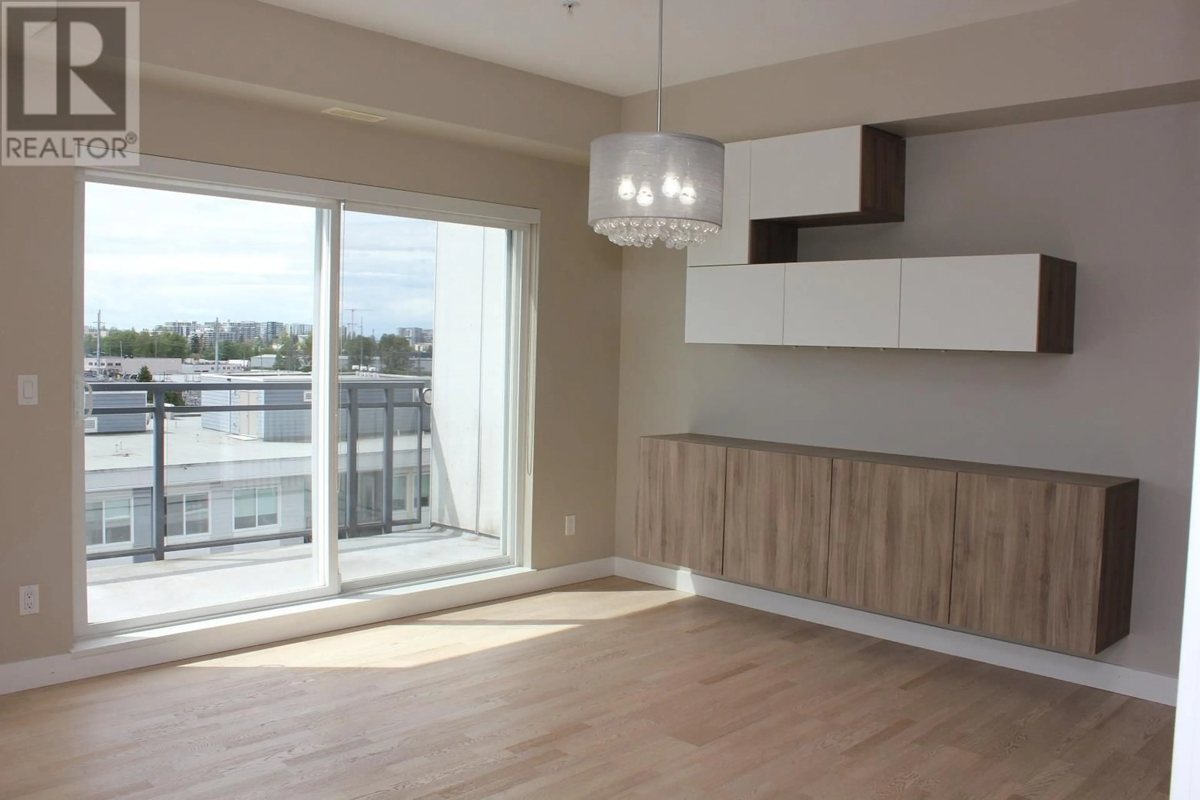 A pic of a room, wood floors for 702 10033 RIVER DRIVE, Richmond British Columbia V6X0L1