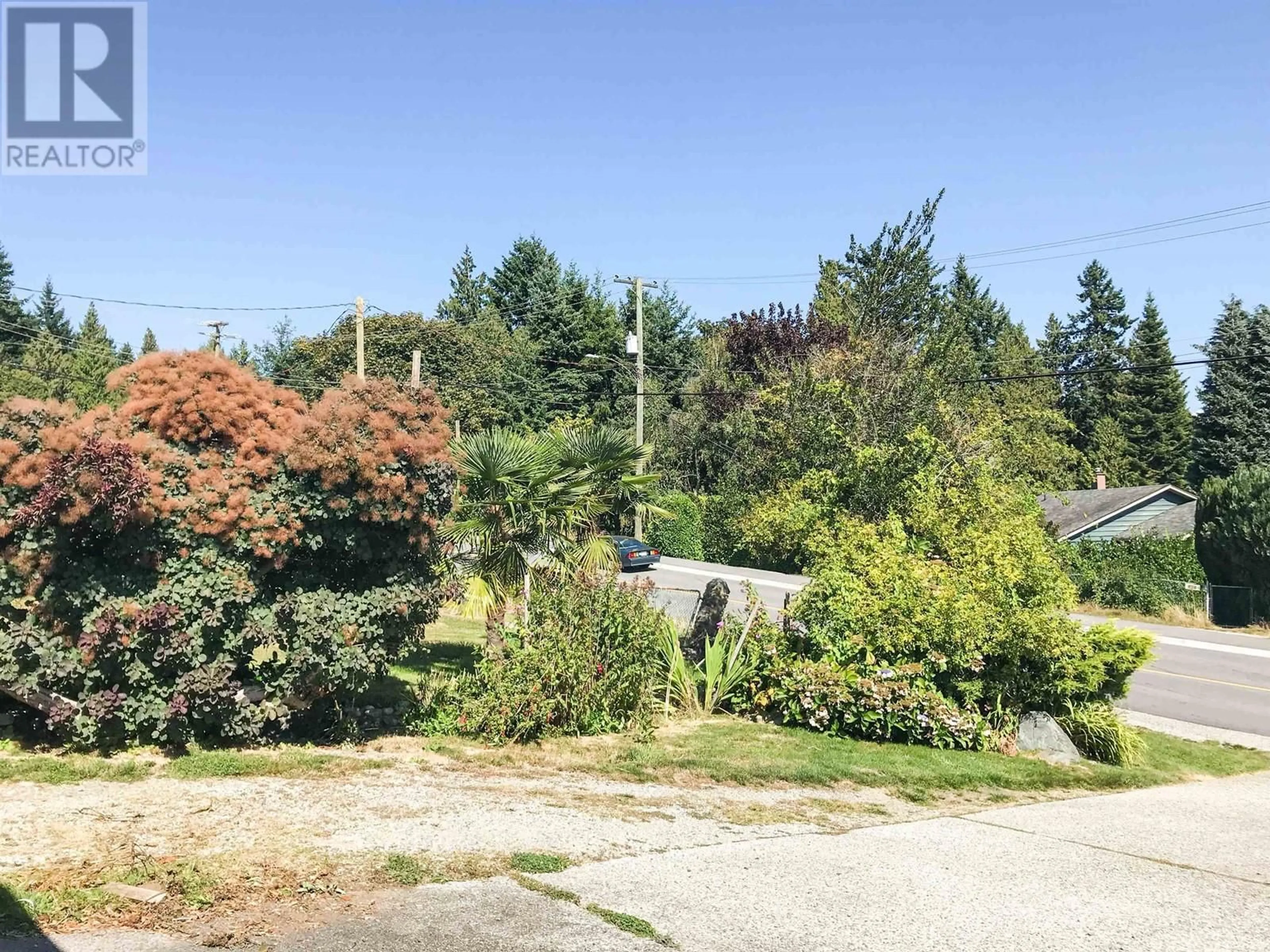 Frontside or backside of a home, the fenced backyard for 639 GIBSONS WAY, Gibsons British Columbia V0N1V9