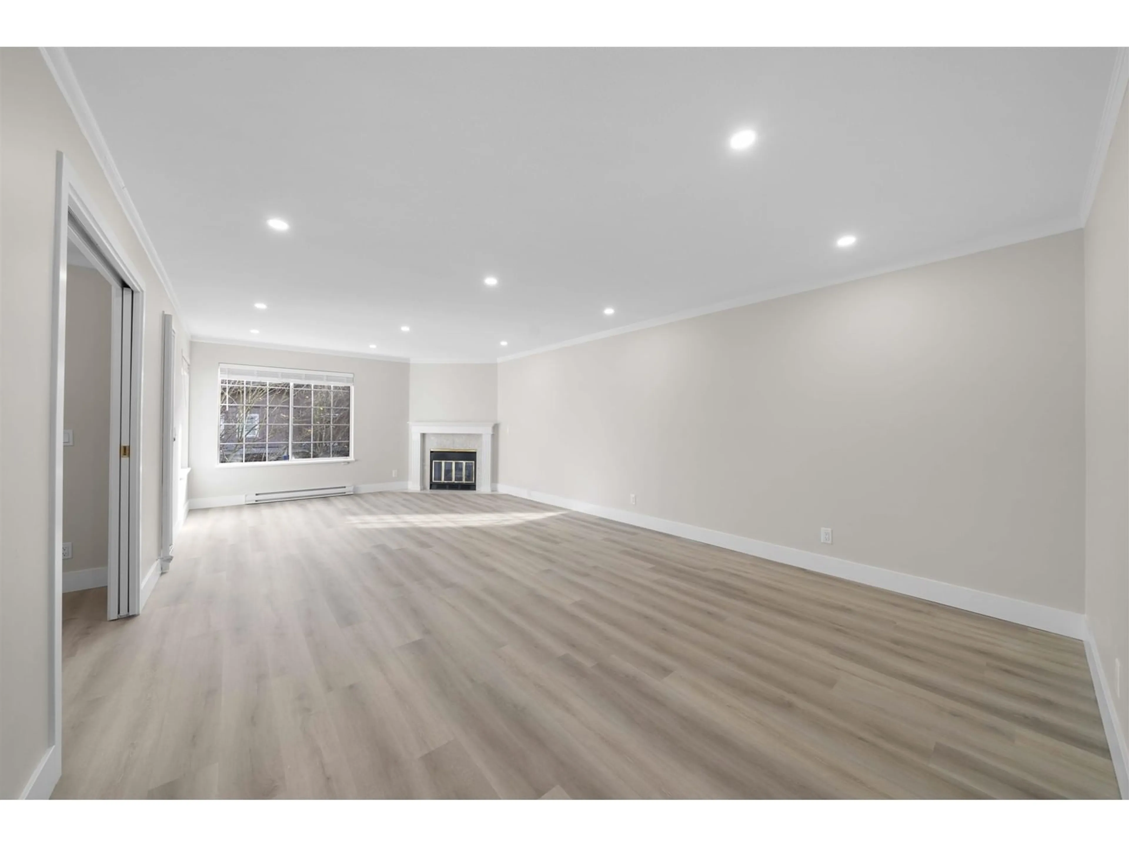 A pic of a room, wood floors for 206 13910 101 AVENUE, Surrey British Columbia V3T1L6