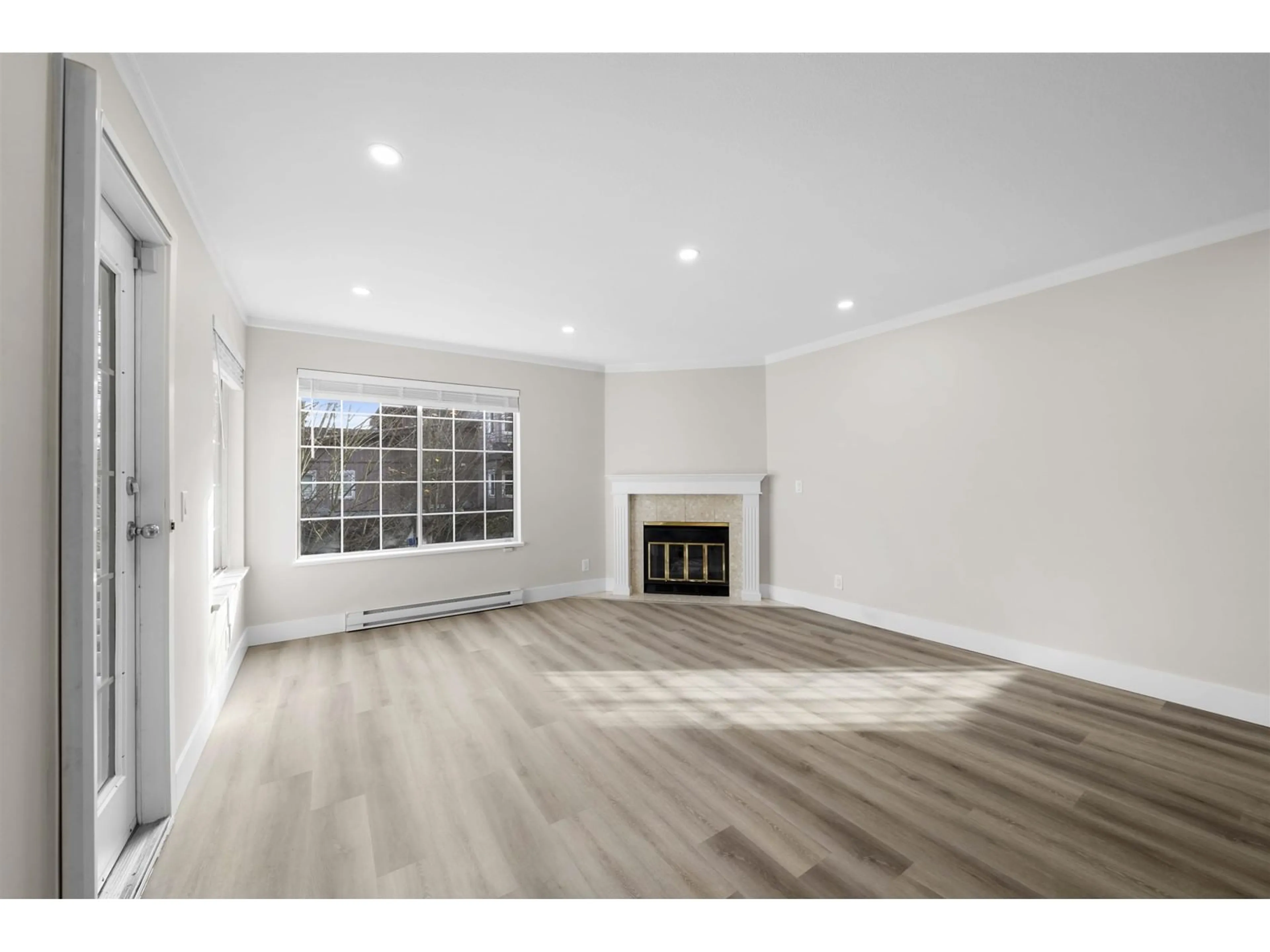 A pic of a room, wood floors for 206 13910 101 AVENUE, Surrey British Columbia V3T1L6