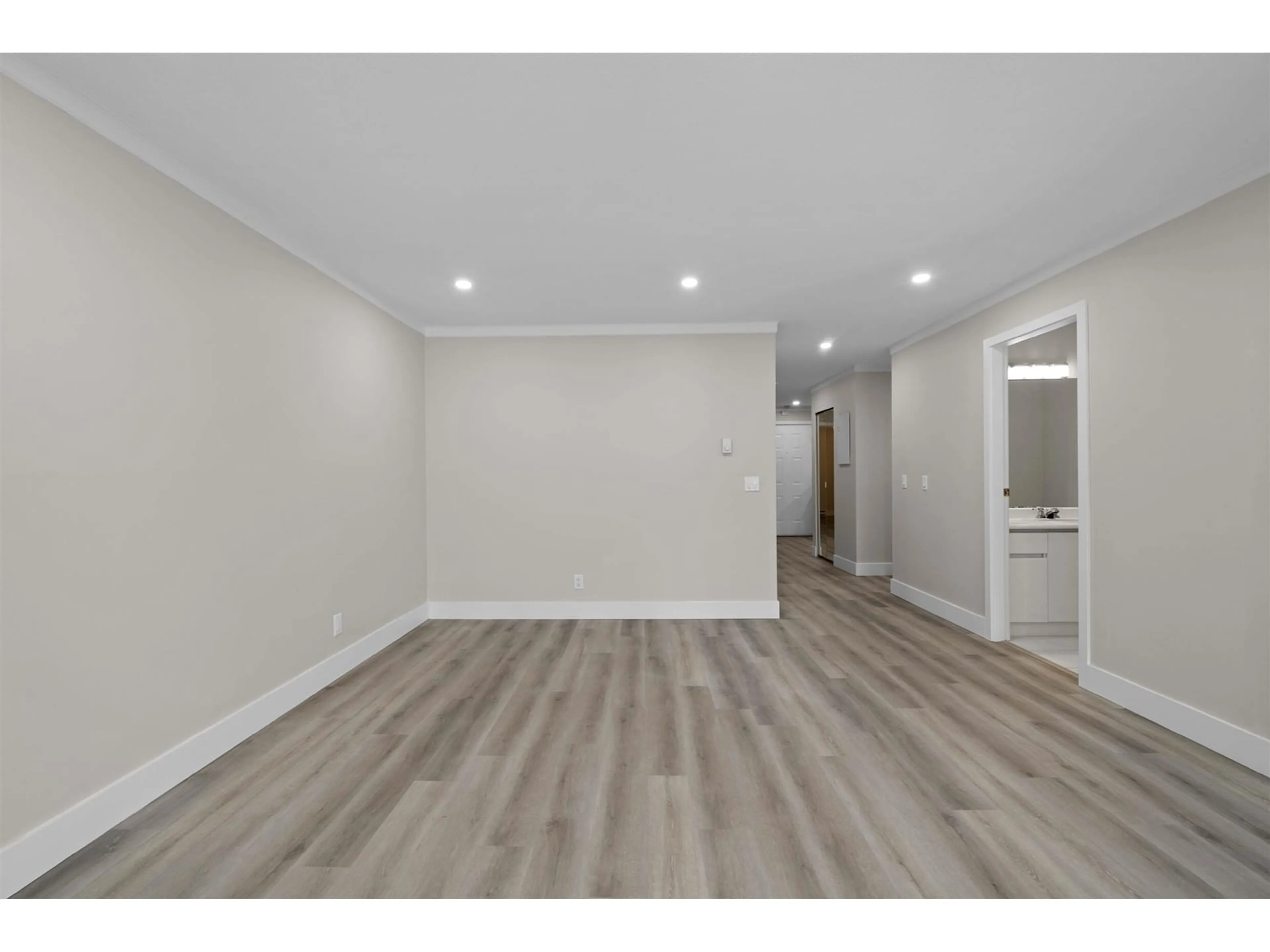 A pic of a room, wood floors for 206 13910 101 AVENUE, Surrey British Columbia V3T1L6