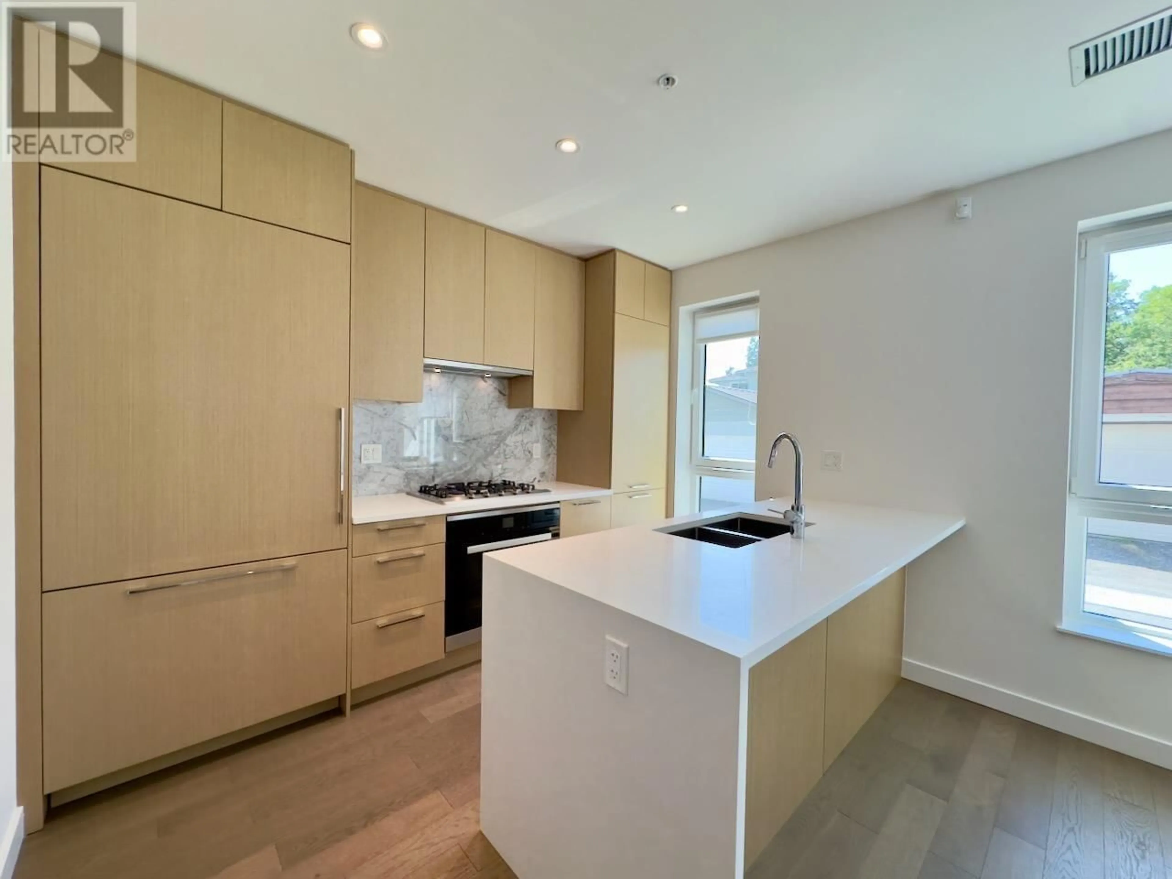 Open concept kitchen for 5385 CAMBIE STREET, Vancouver British Columbia V5Z2Z9