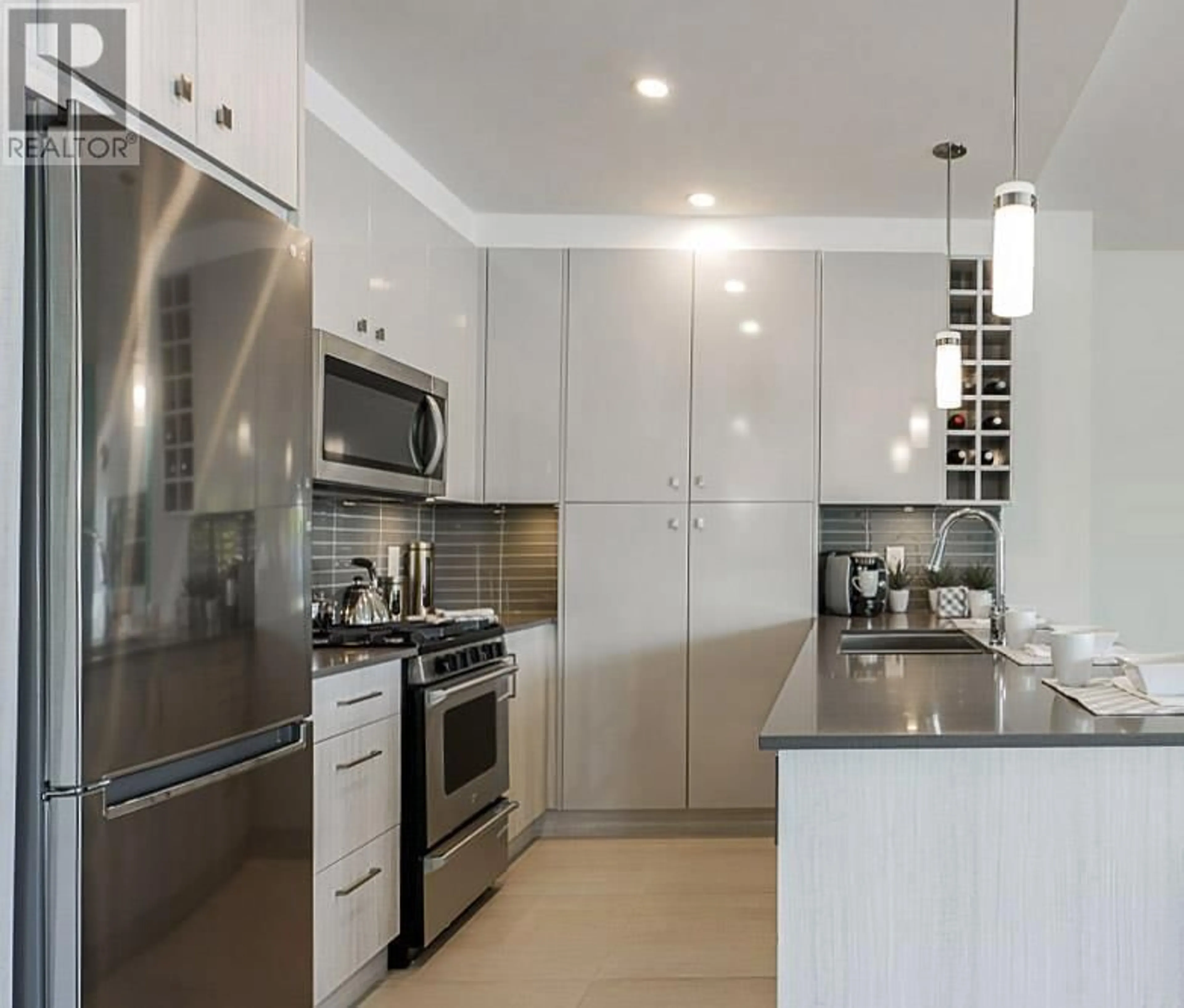 Contemporary kitchen, wood floors for 116 - 23200 GILLEY ROAD, Richmond British Columbia V6V2L6