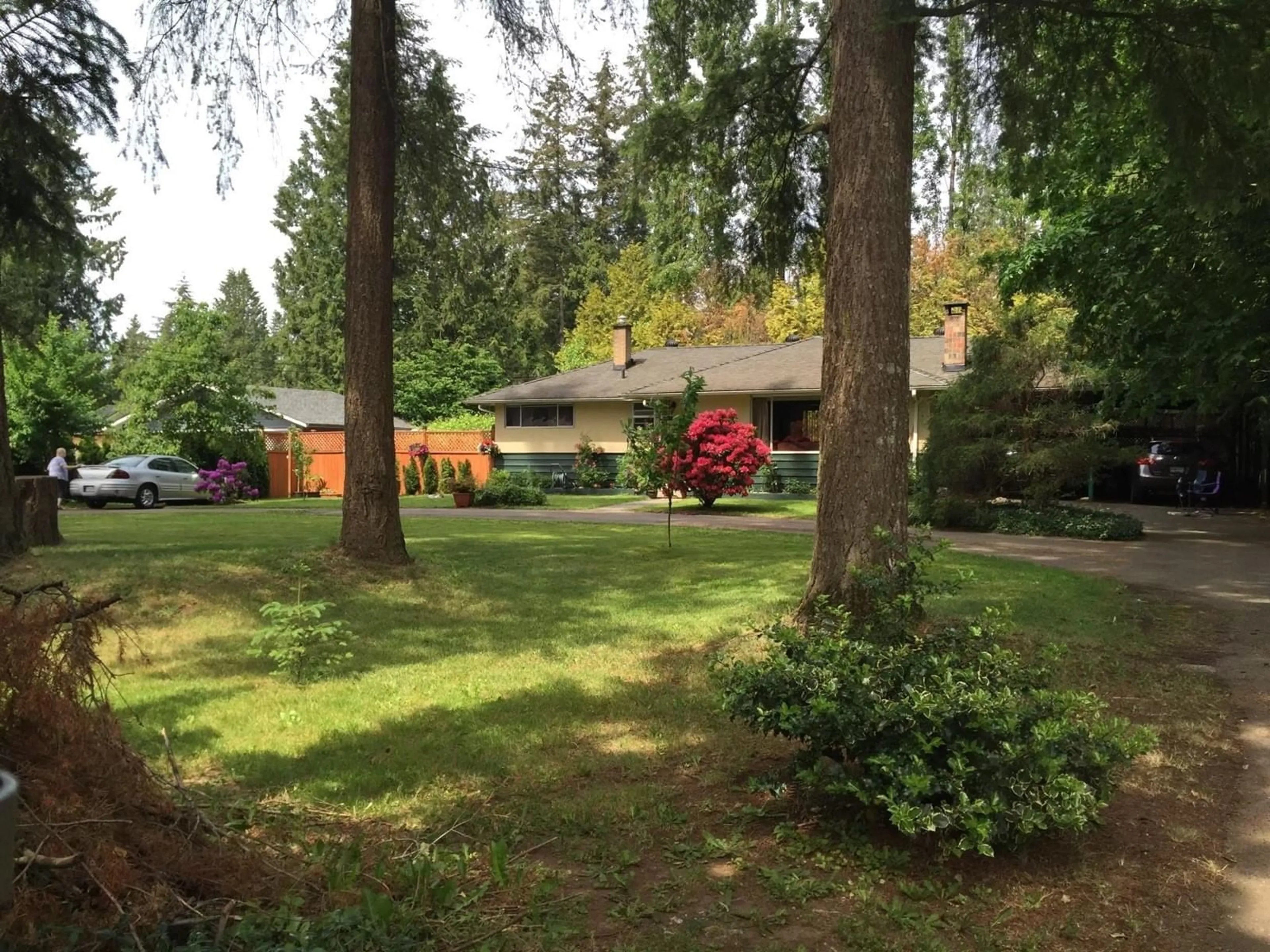 Frontside or backside of a home, the fenced backyard for 19875 36 AVENUE, Langley British Columbia V3A2R3