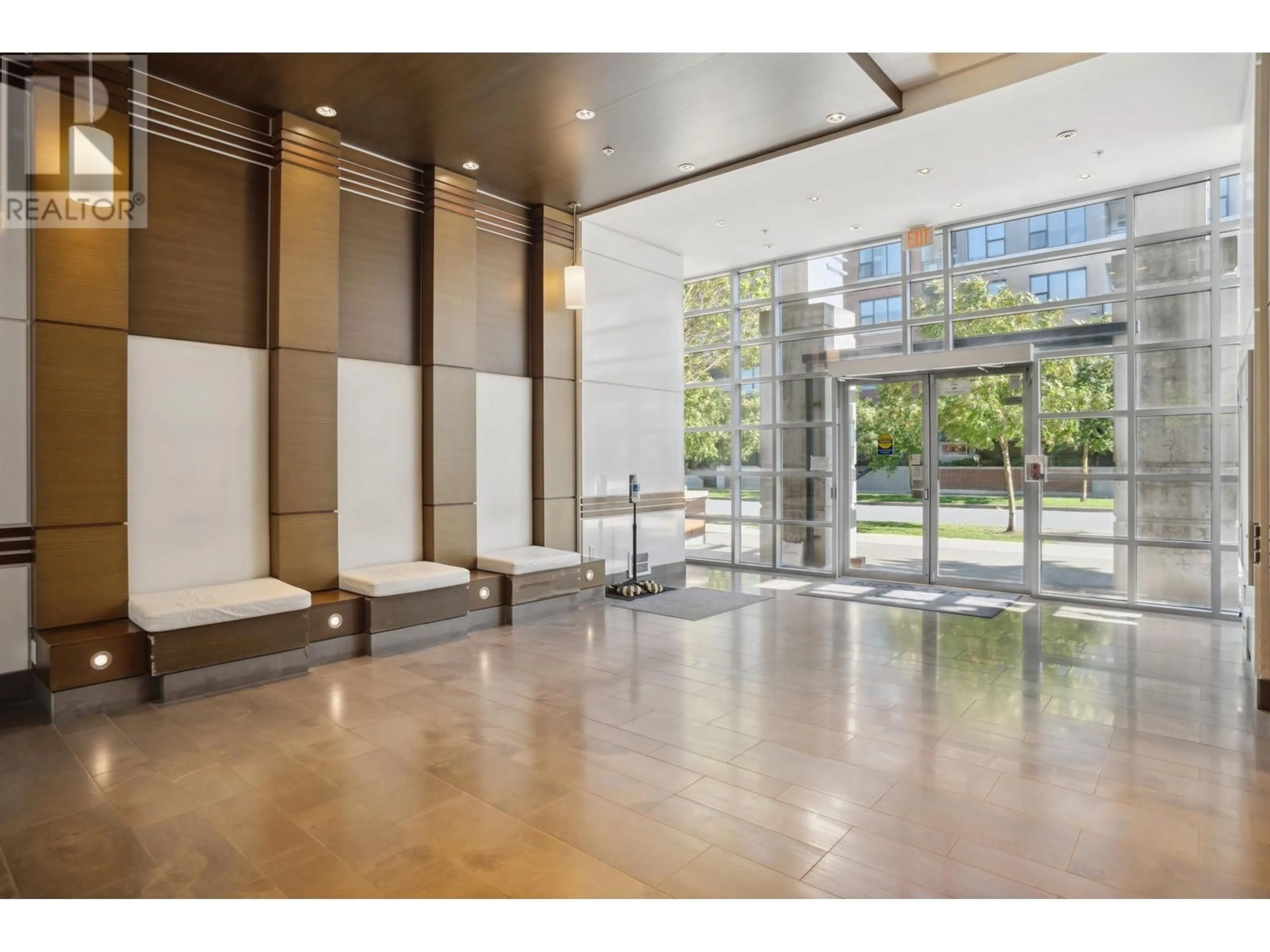 Indoor lobby, cement floor for 409 9399 TOMICKI AVENUE, Richmond British Columbia V6X0H6