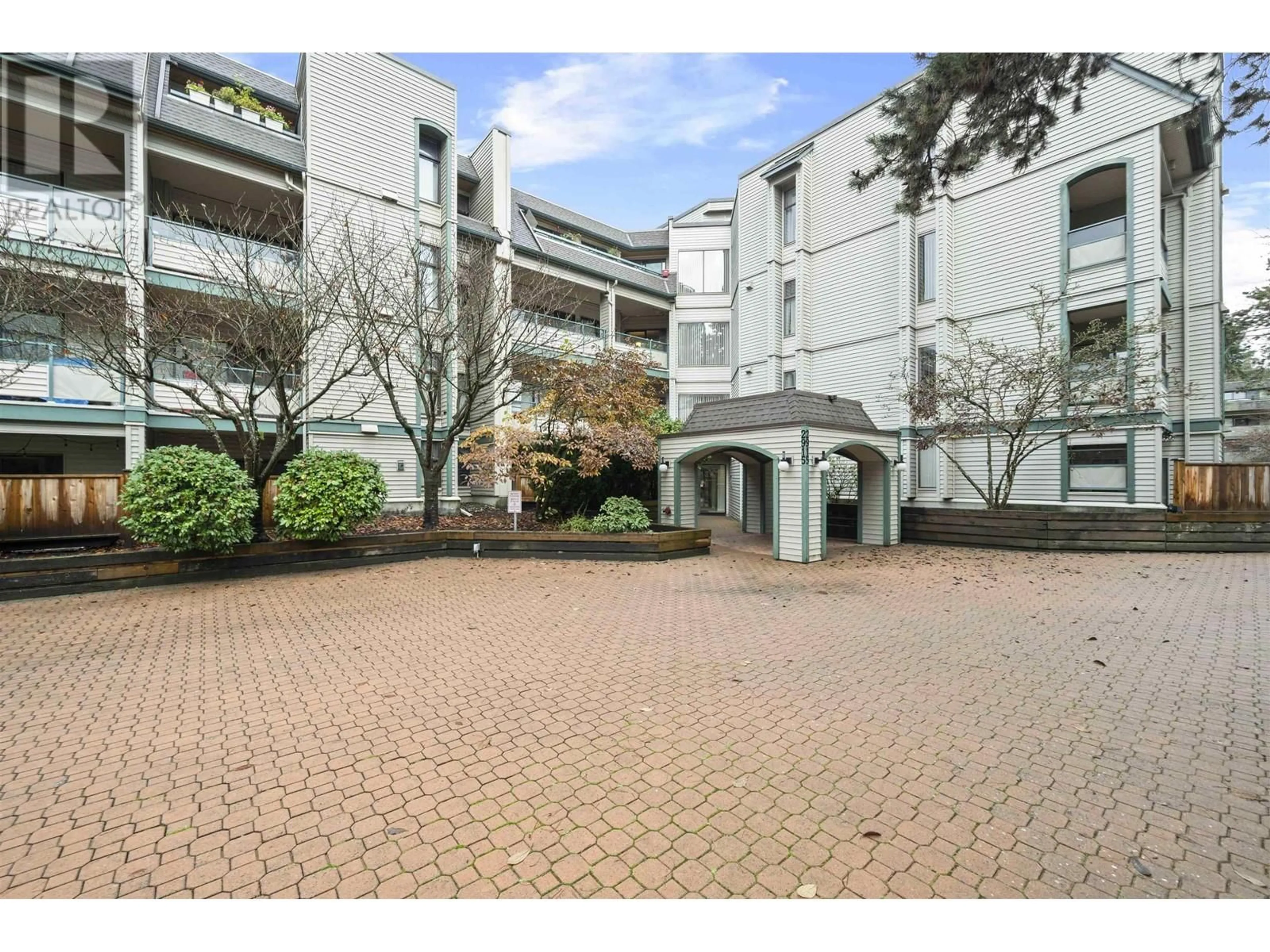 A pic from exterior of the house or condo, the front or back of building for 416 2915 GLEN DRIVE, Coquitlam British Columbia V3B7H8