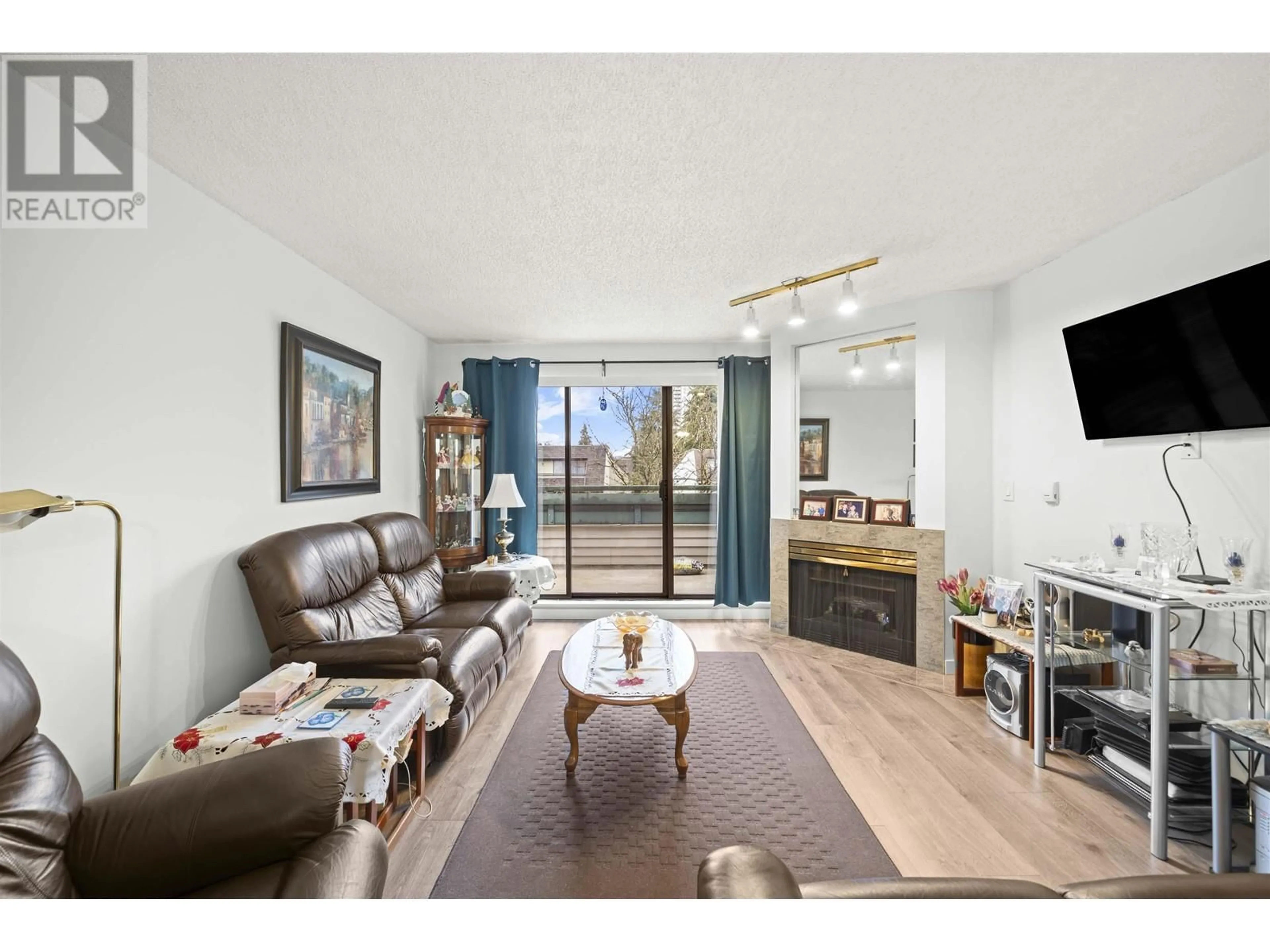 Living room, wood floors for 416 2915 GLEN DRIVE, Coquitlam British Columbia V3B7H8