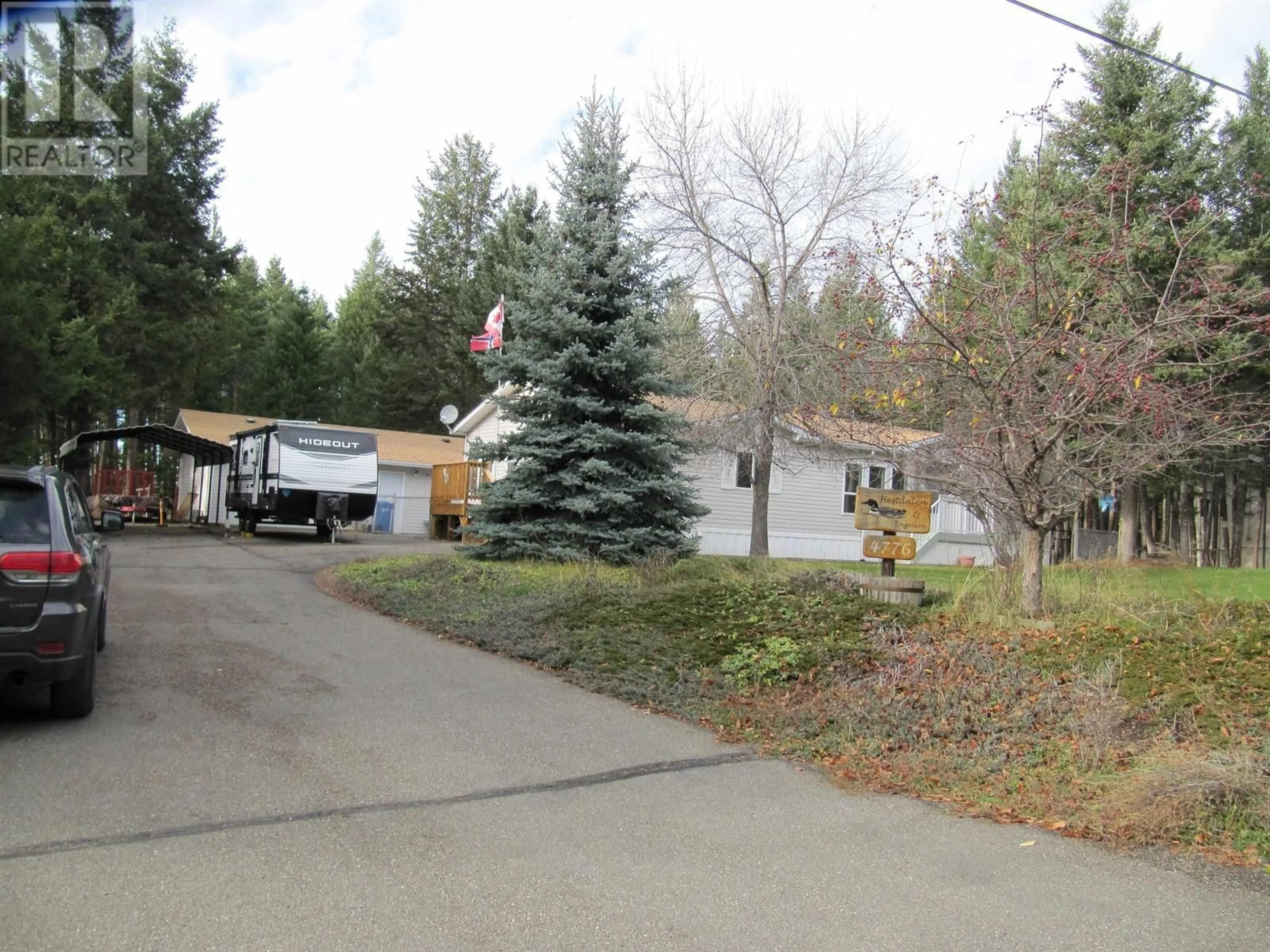 Frontside or backside of a home, the street view for 4776 MONEEYAW ROAD, 108 Mile Ranch British Columbia V0K2Z0