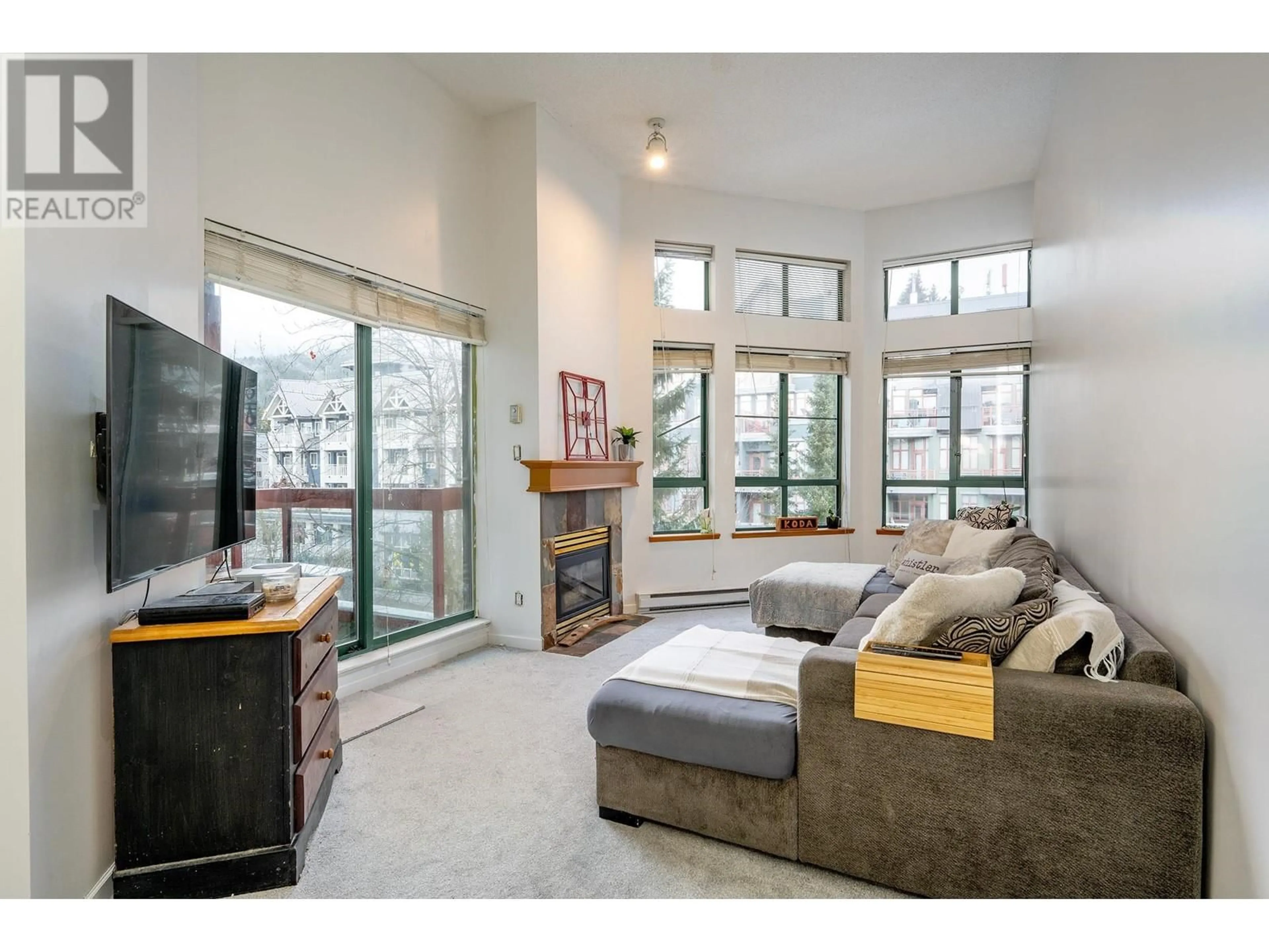 Living room, wood floors for 305 4368 MAIN STREET, Whistler British Columbia V8E1B6