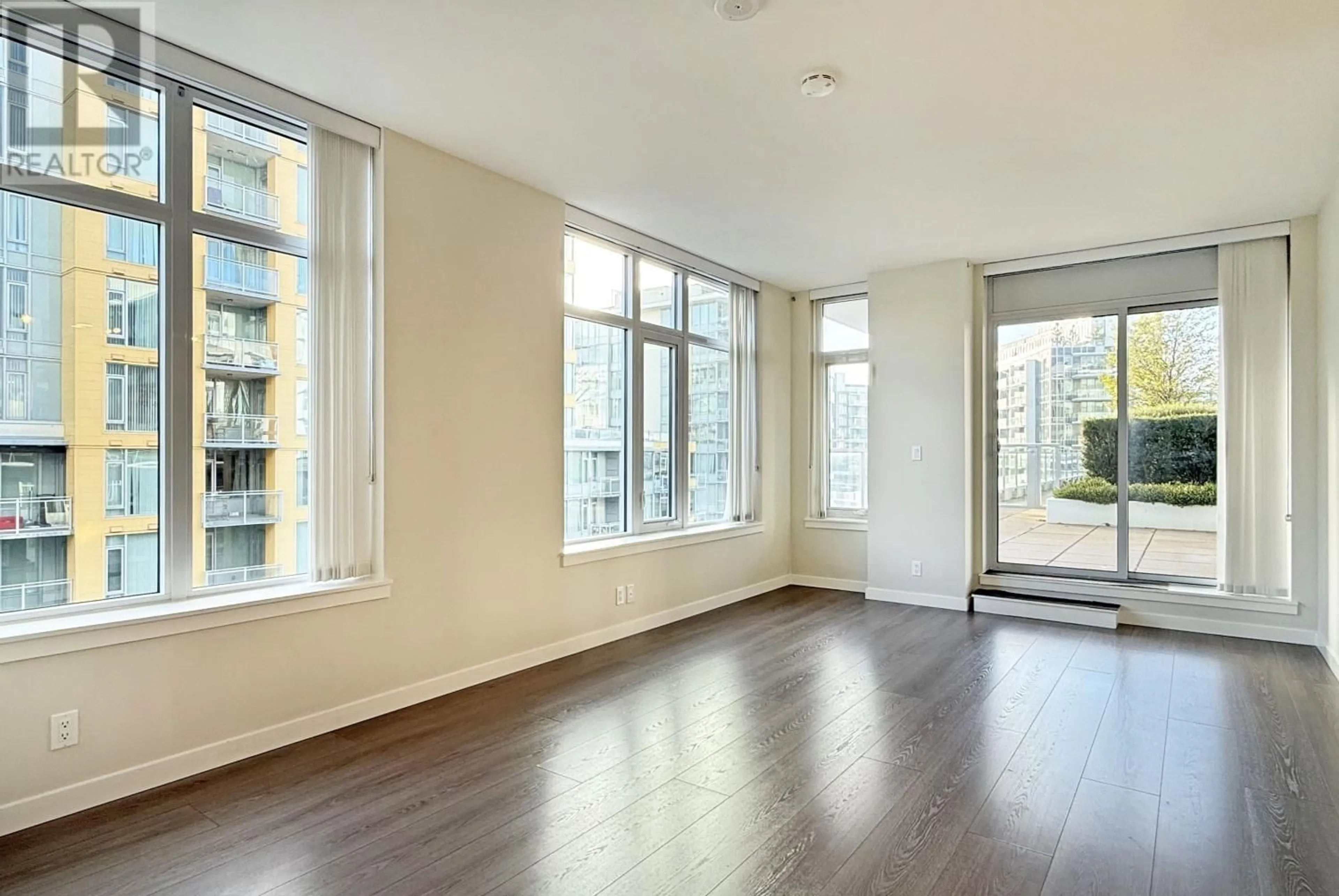 A pic of a room, wood floors for 1011 8699 HAZELBRIDGE WAY, Richmond British Columbia V6X0T4