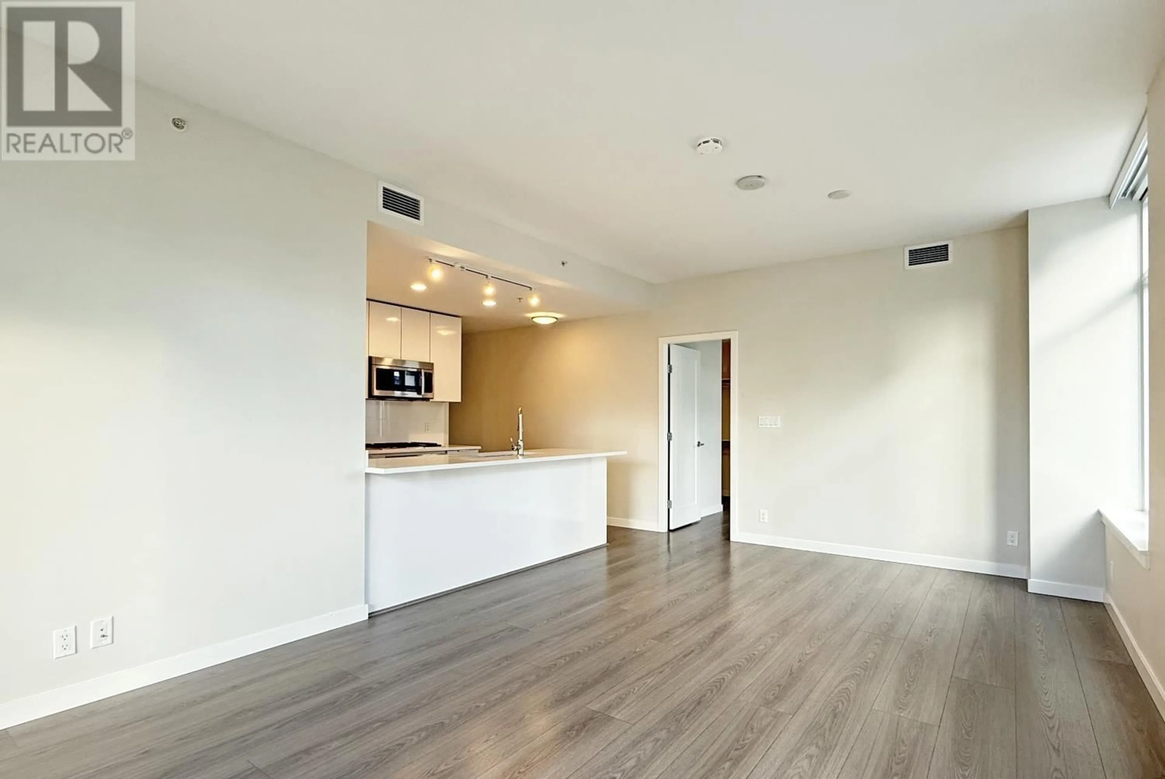 A pic of a room, wood floors for 1011 8699 HAZELBRIDGE WAY, Richmond British Columbia V6X0T4