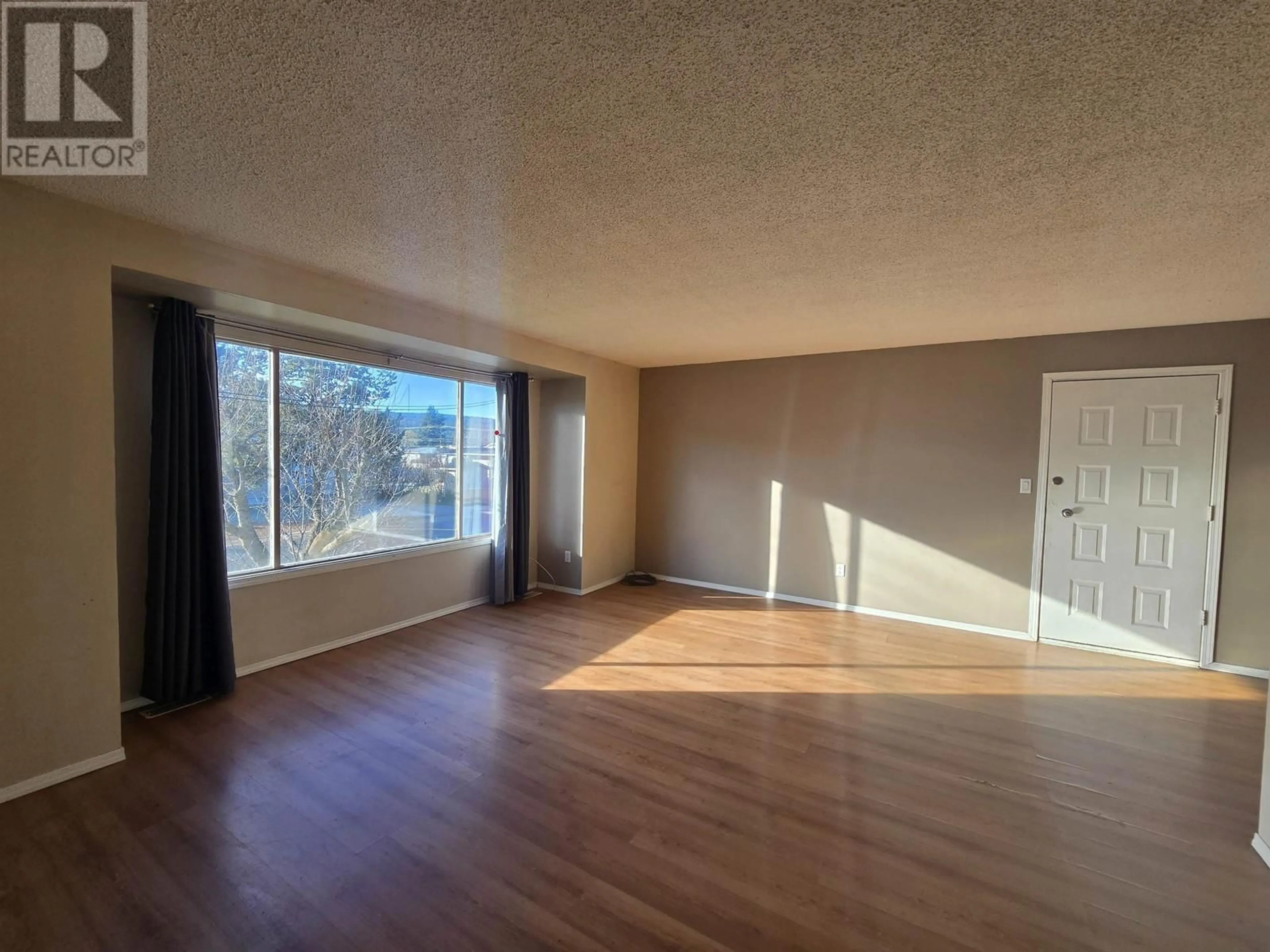 A pic of a room, wood floors for 430 ASPEN STREET, 100 Mile House British Columbia V0K2E0