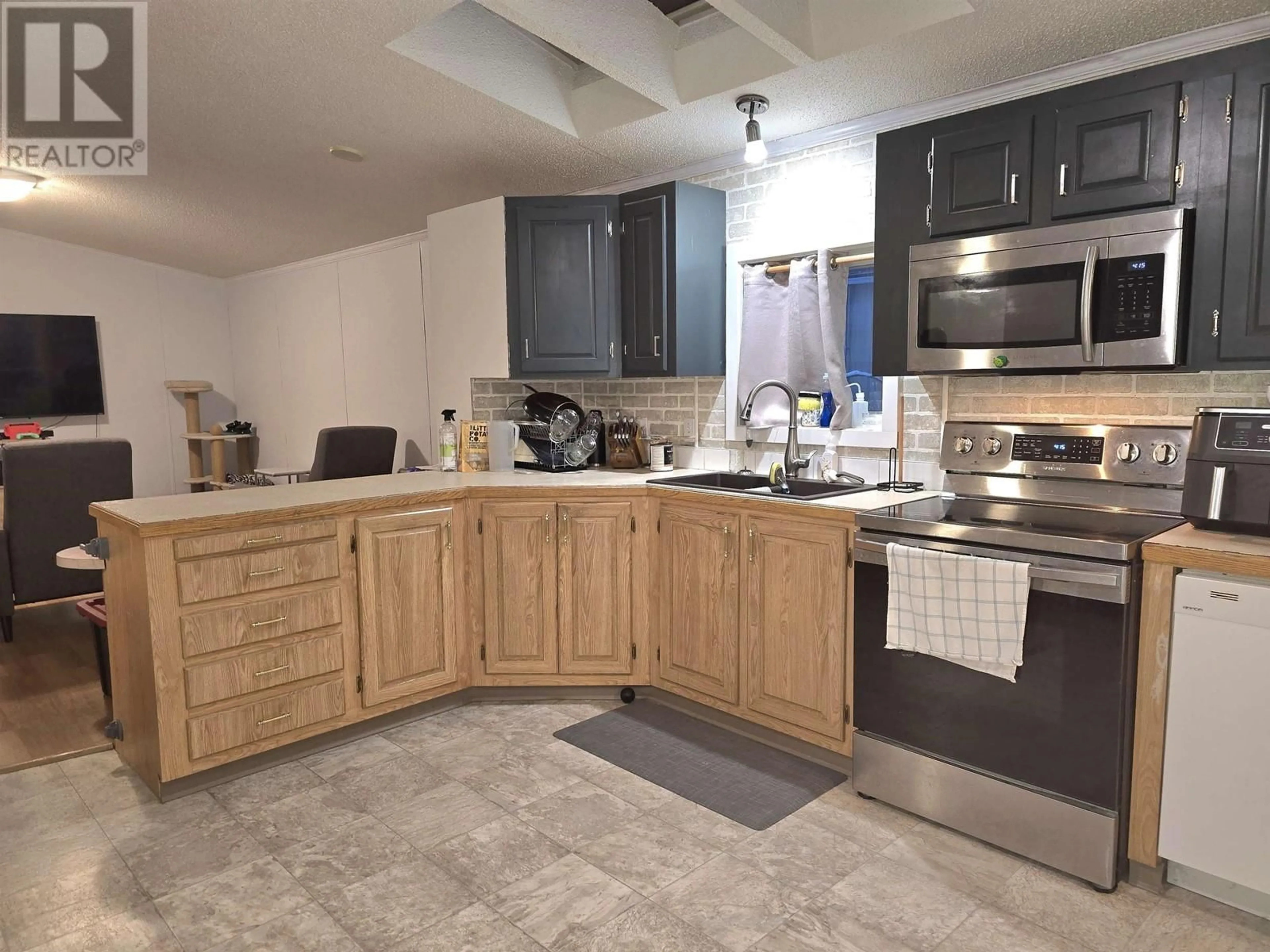 Kitchen, ceramic floors for 146 2500 GRANT ROAD, Prince George British Columbia V2K4X9