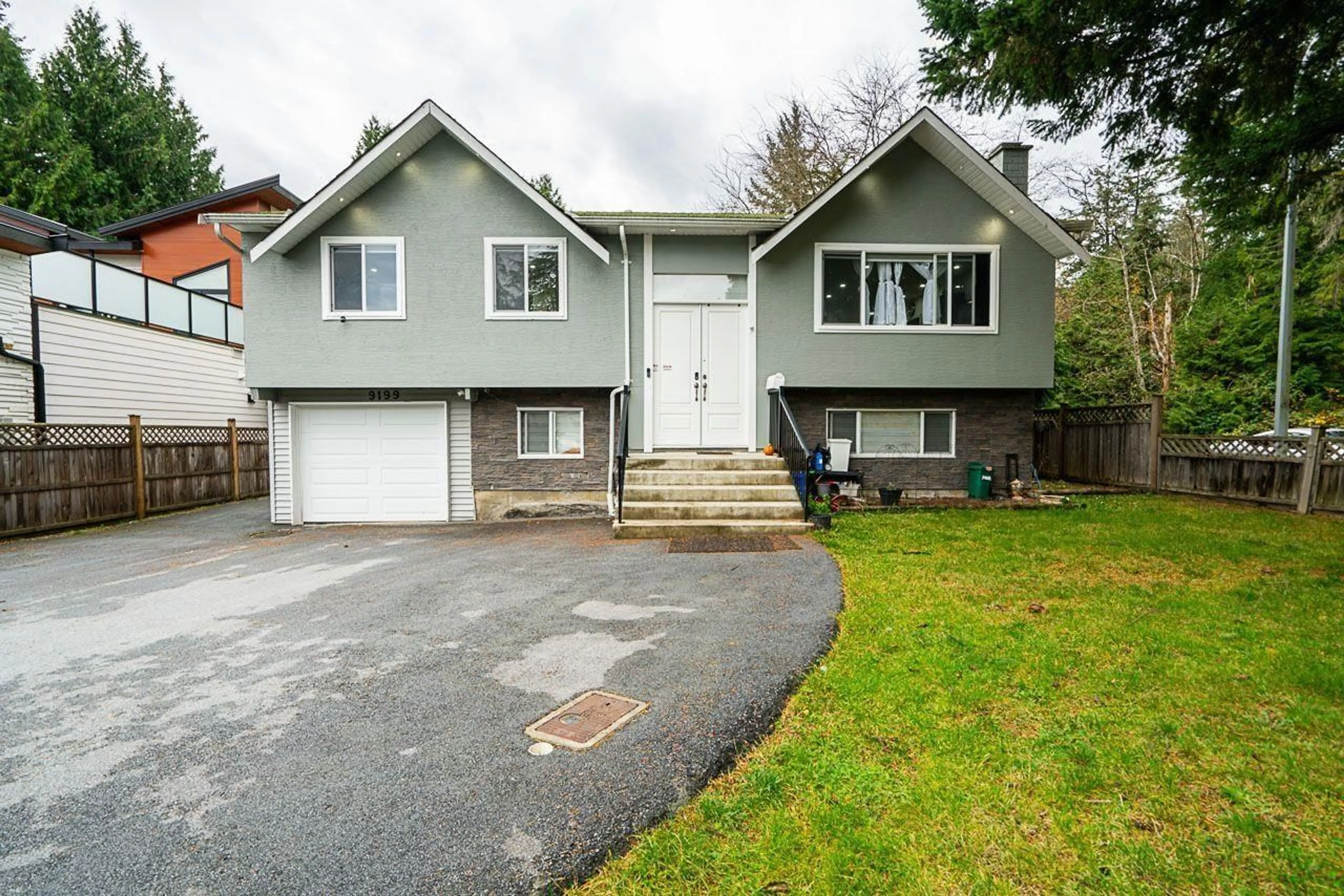 Frontside or backside of a home, cottage for 9199 147 STREET, Surrey British Columbia V3R3V6