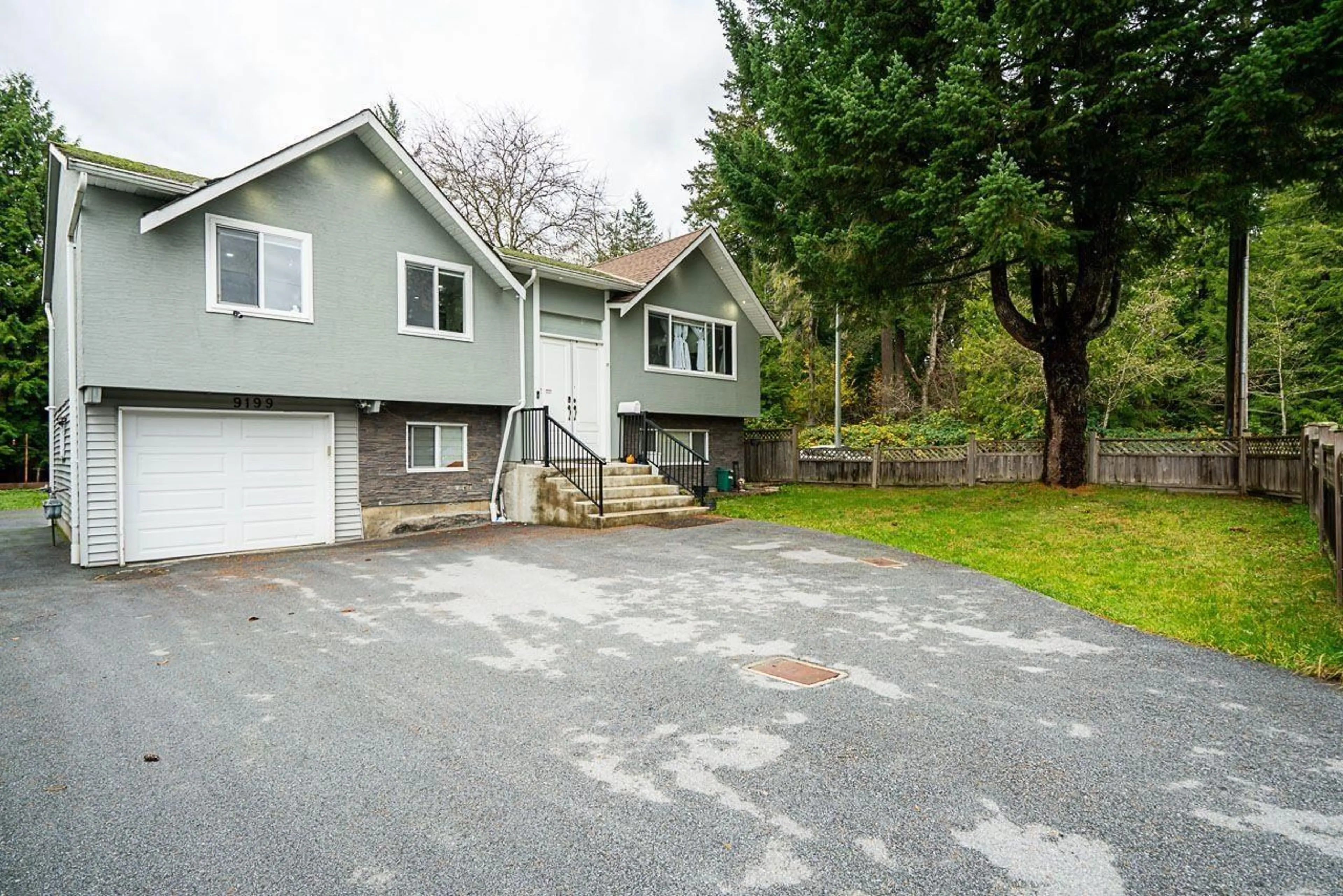 Frontside or backside of a home, cottage for 9199 147 STREET, Surrey British Columbia V3R3V6