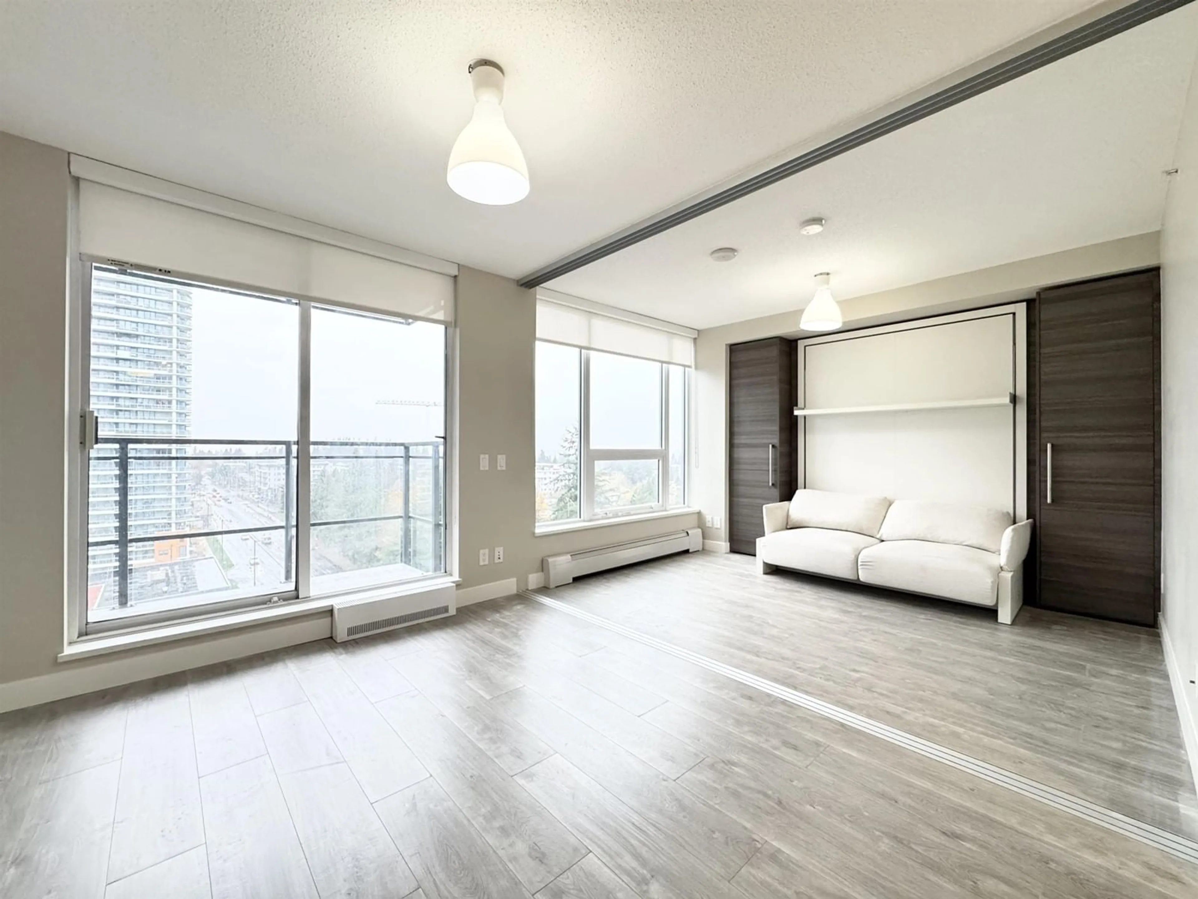 A pic of a room, wood floors for 1505 13398 104 AVENUE, Surrey British Columbia V3T1V6