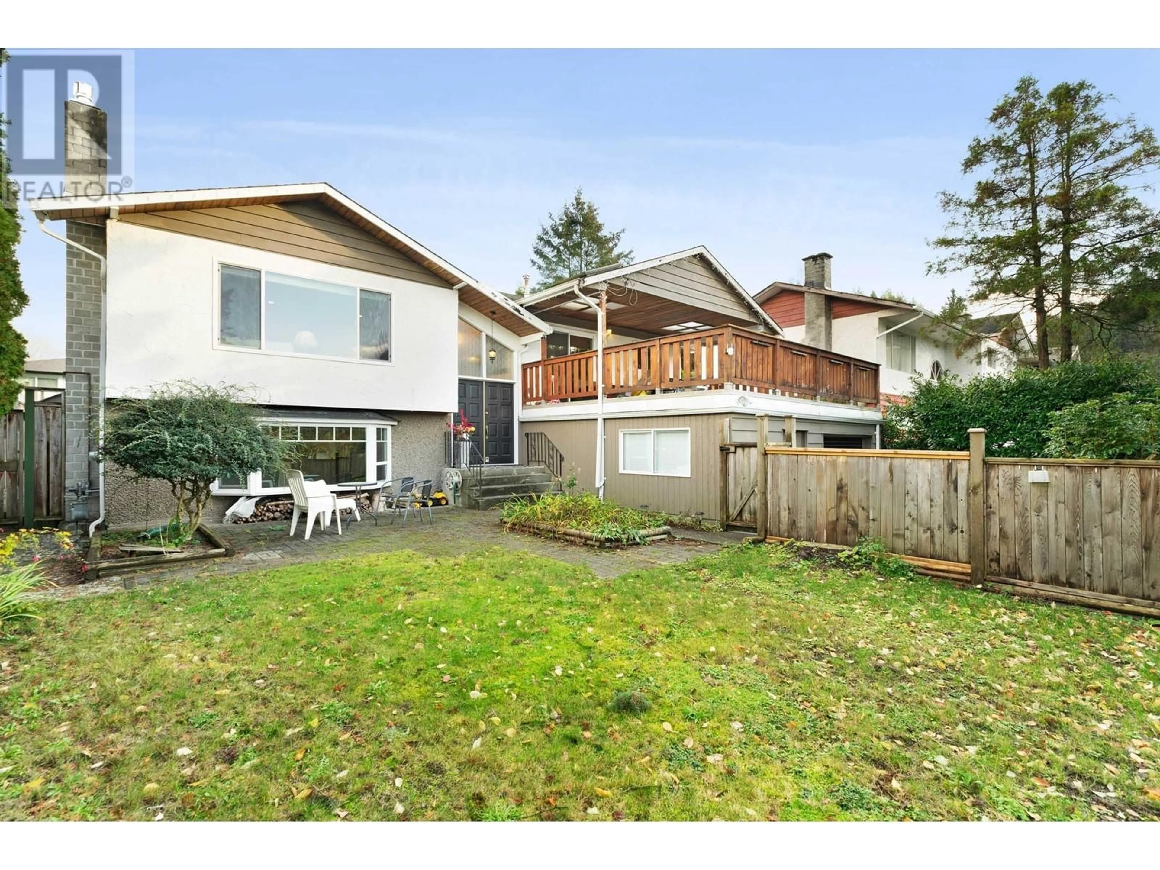 Frontside or backside of a home, the fenced backyard for 1077 BUOY DRIVE, Coquitlam British Columbia V3H3E8