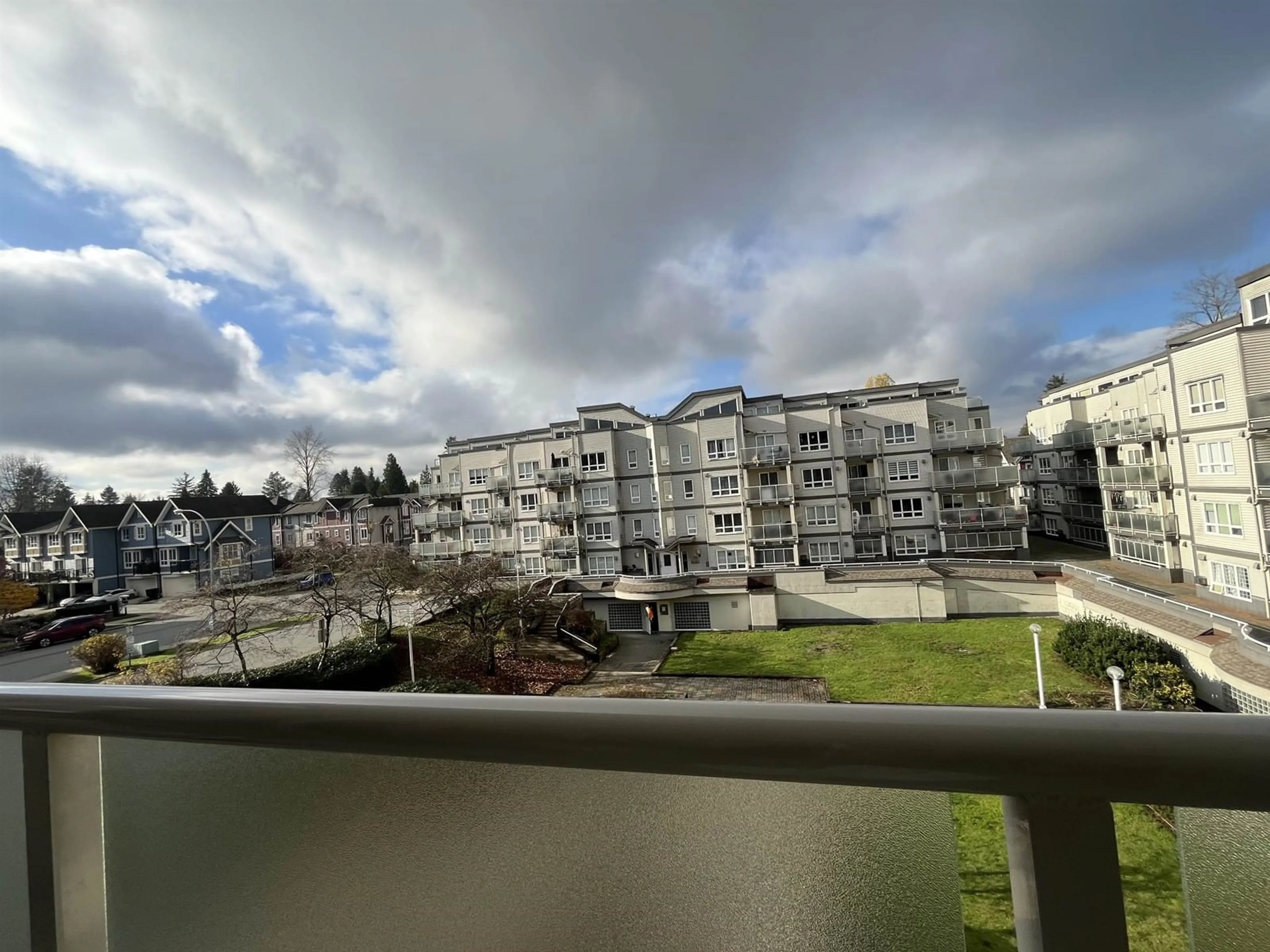 A pic from exterior of the house or condo, the street view for 301 14399 103 AVENUE, Surrey British Columbia V3T5V5