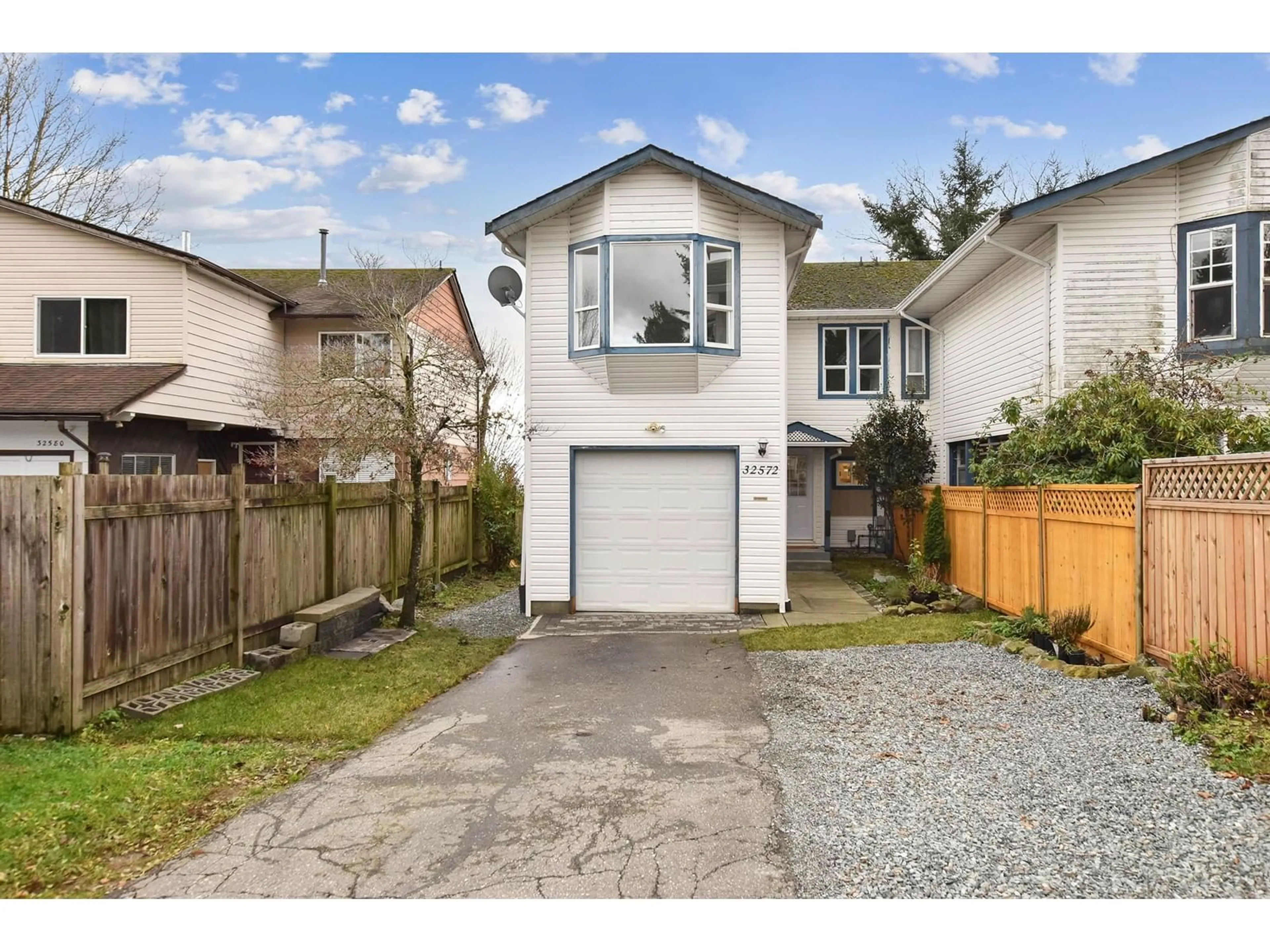 Frontside or backside of a home, the fenced backyard for 32572 BOBCAT DRIVE, Mission British Columbia V2V5L1