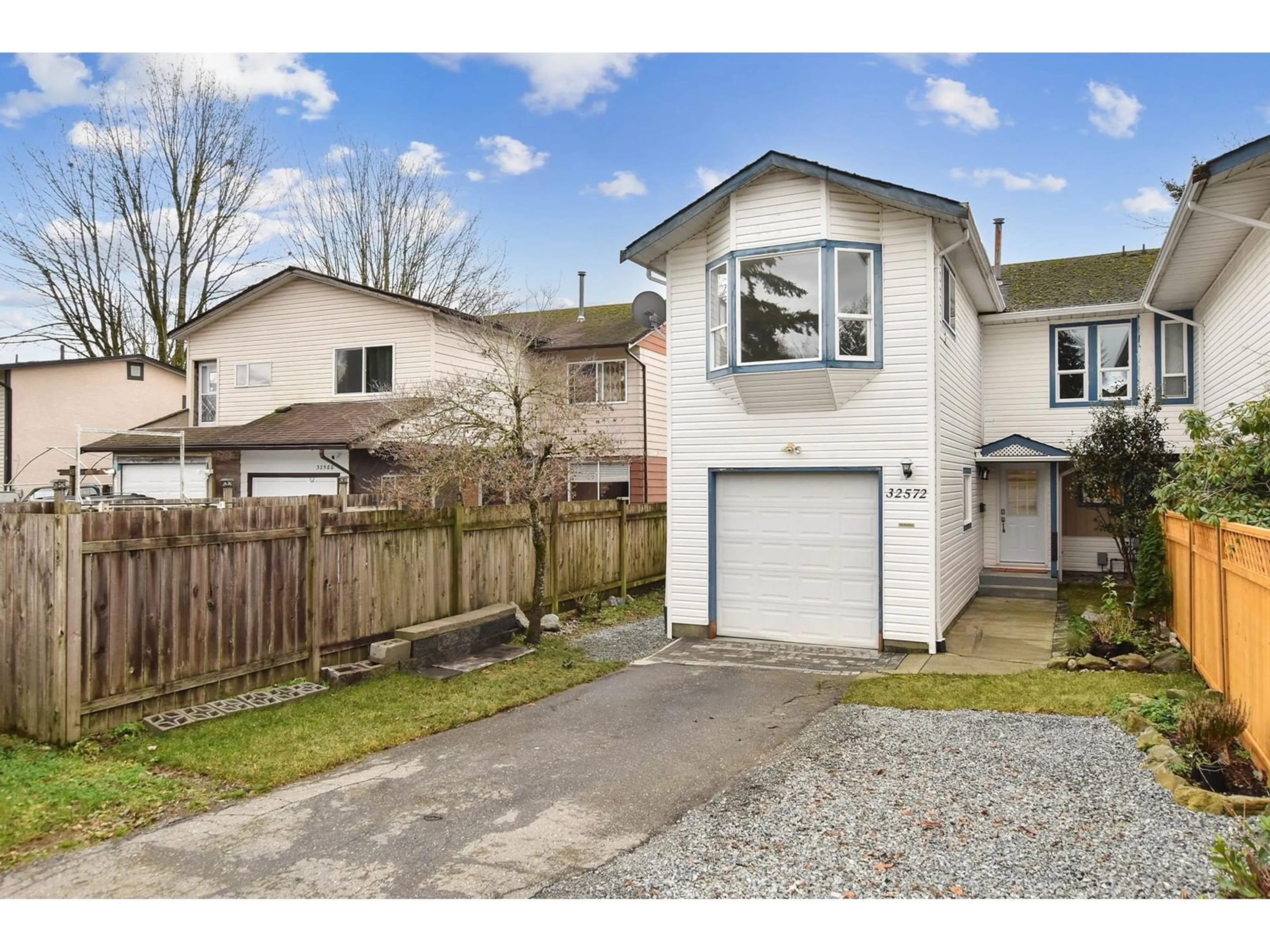 Frontside or backside of a home, the fenced backyard for 32572 BOBCAT DRIVE, Mission British Columbia V2V5L1