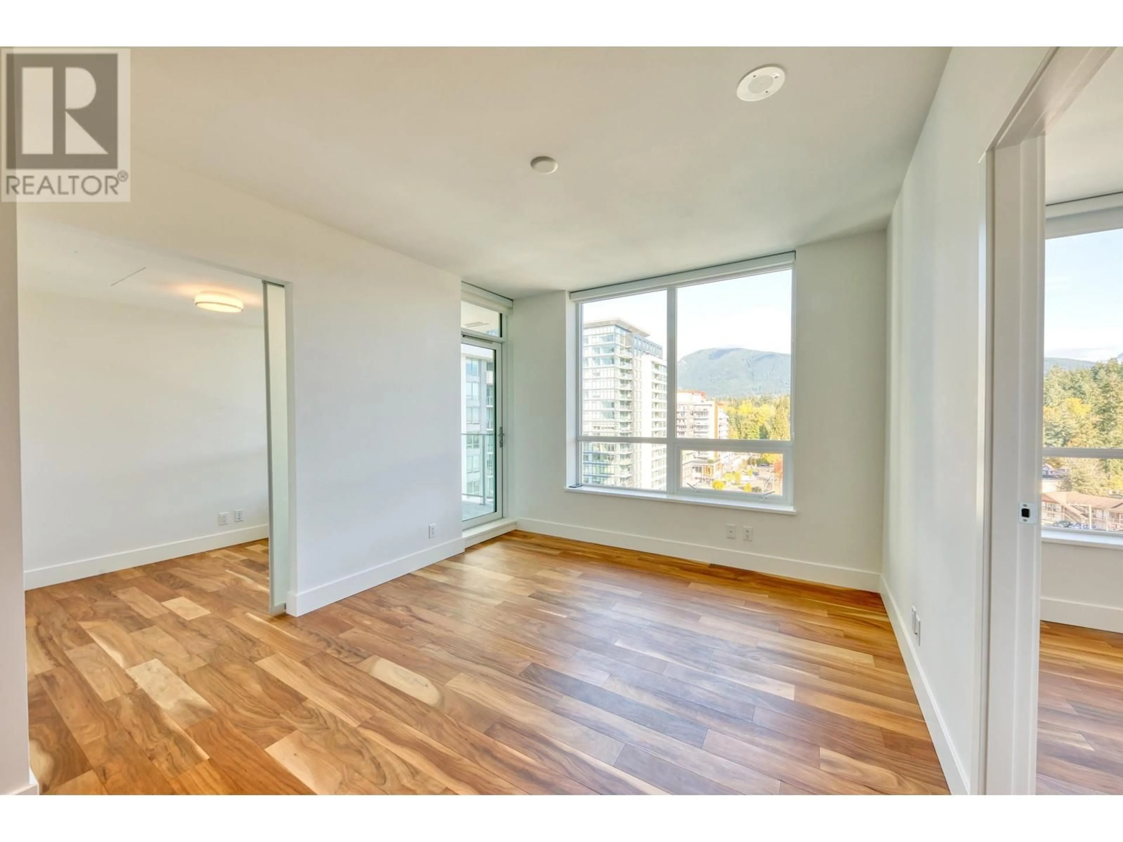 A pic of a room, wood floors for 1008 1632 LIONS GATE LANE, North Vancouver British Columbia V7P0E2