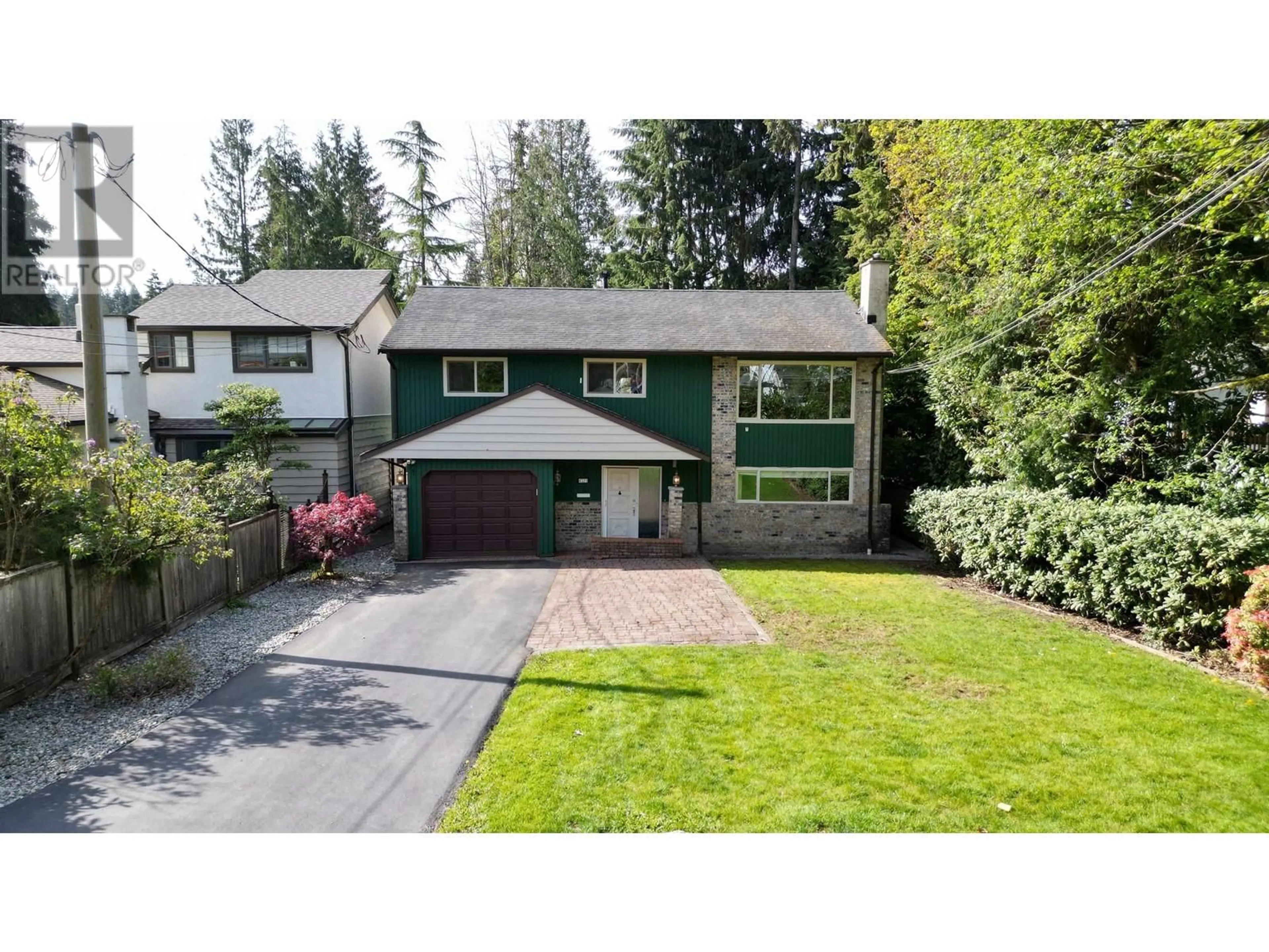 Frontside or backside of a home, the fenced backyard for 4325 RAEBURN STREET, North Vancouver British Columbia V7G1K1