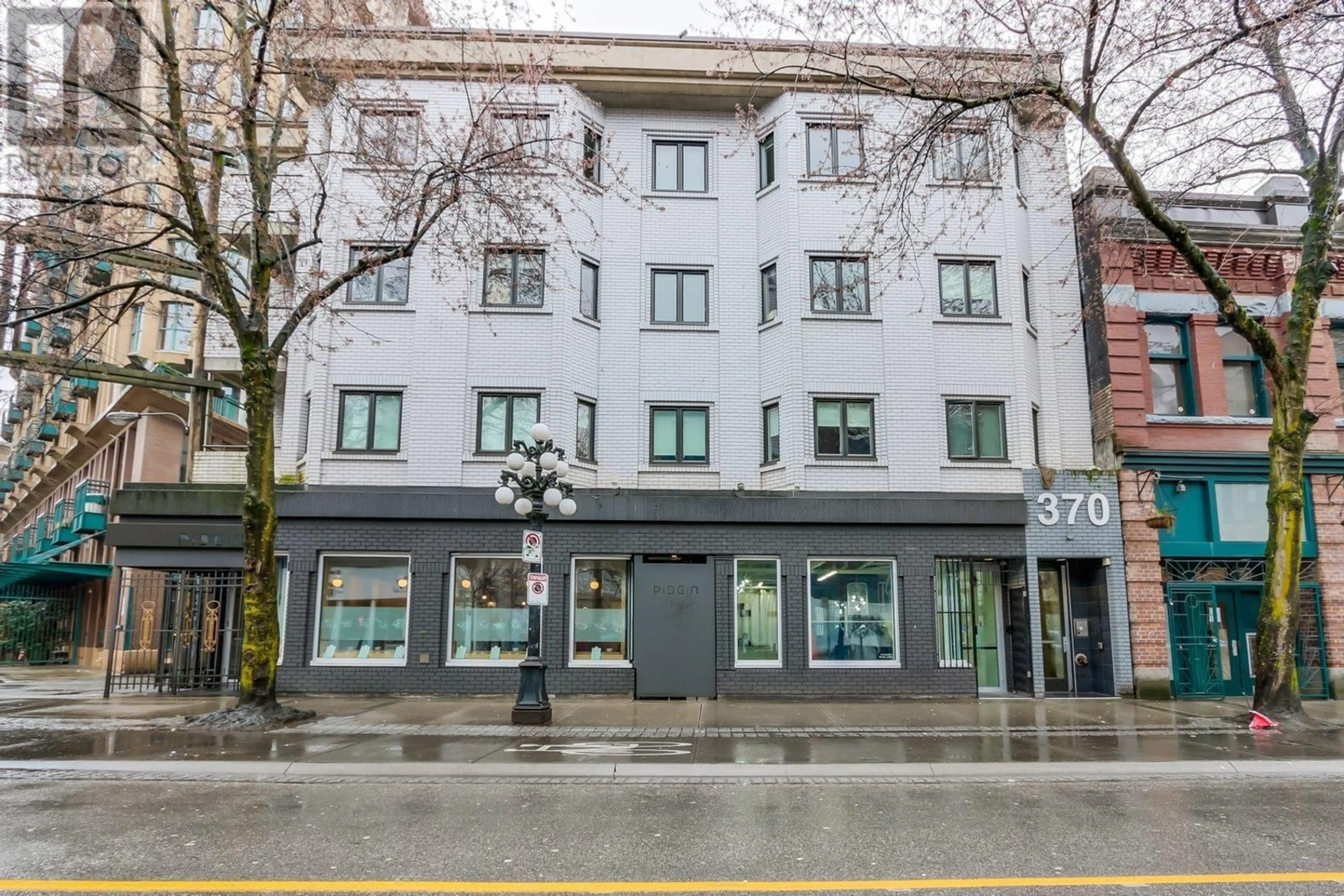 A pic from exterior of the house or condo, the front or back of building for 202 370 CARRALL STREET, Vancouver British Columbia V6B2J3