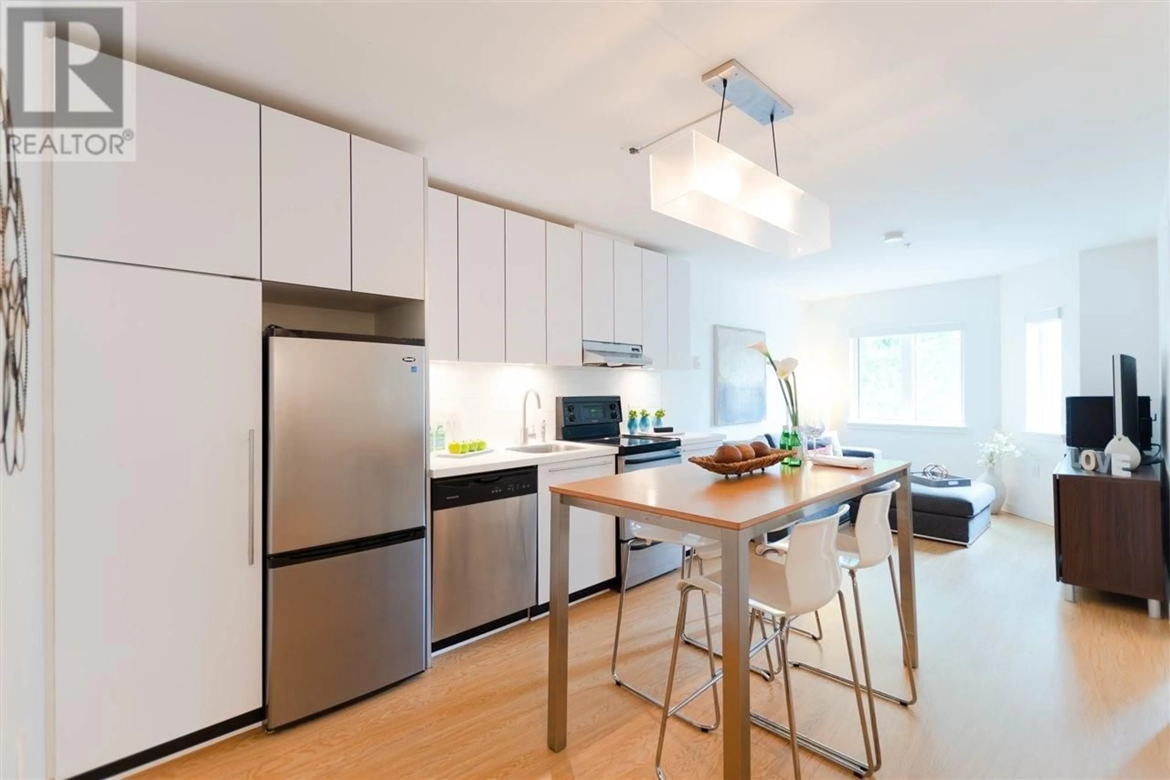 Open concept kitchen for 202 370 CARRALL STREET, Vancouver British Columbia V6B2J3