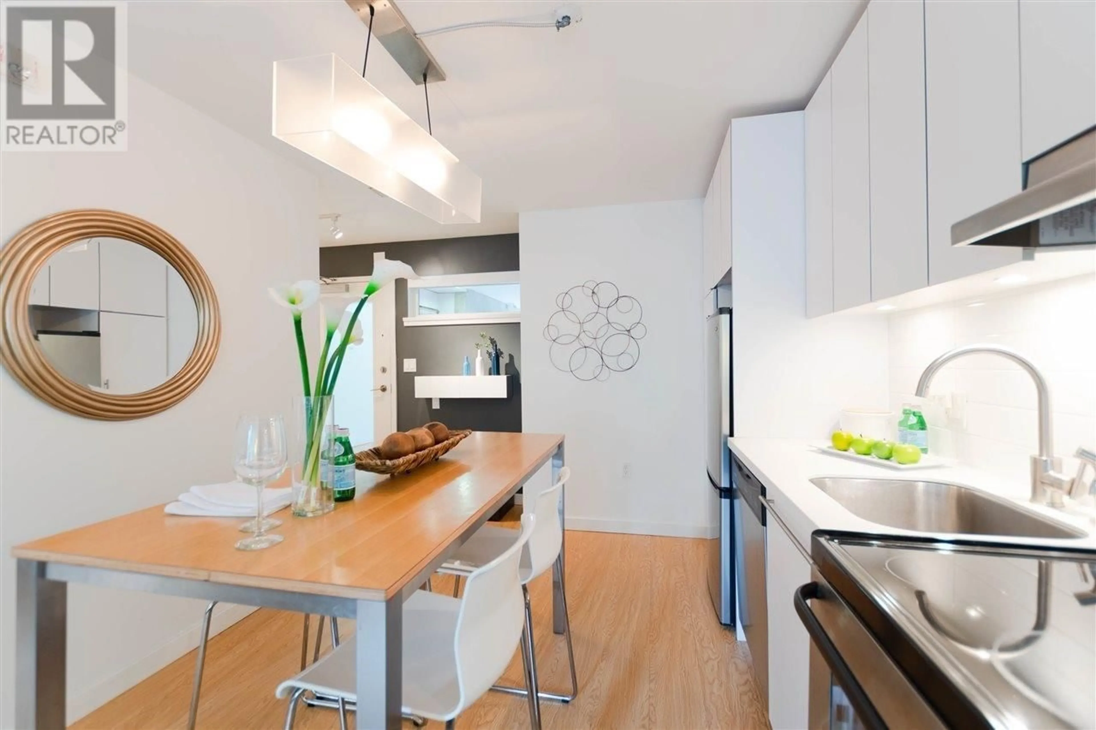 Open concept kitchen for 202 370 CARRALL STREET, Vancouver British Columbia V6B2J3