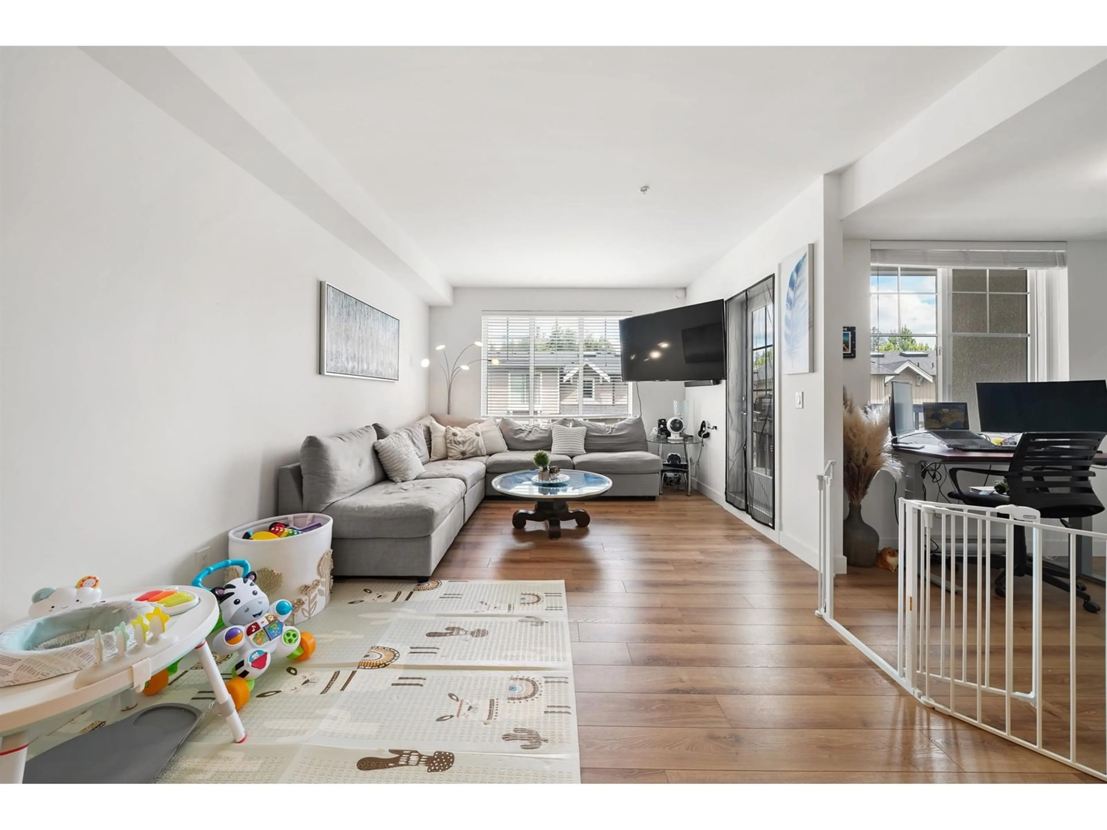 Living room, wood floors for A315 20487 65 AVENUE, Langley British Columbia V2Y3K5