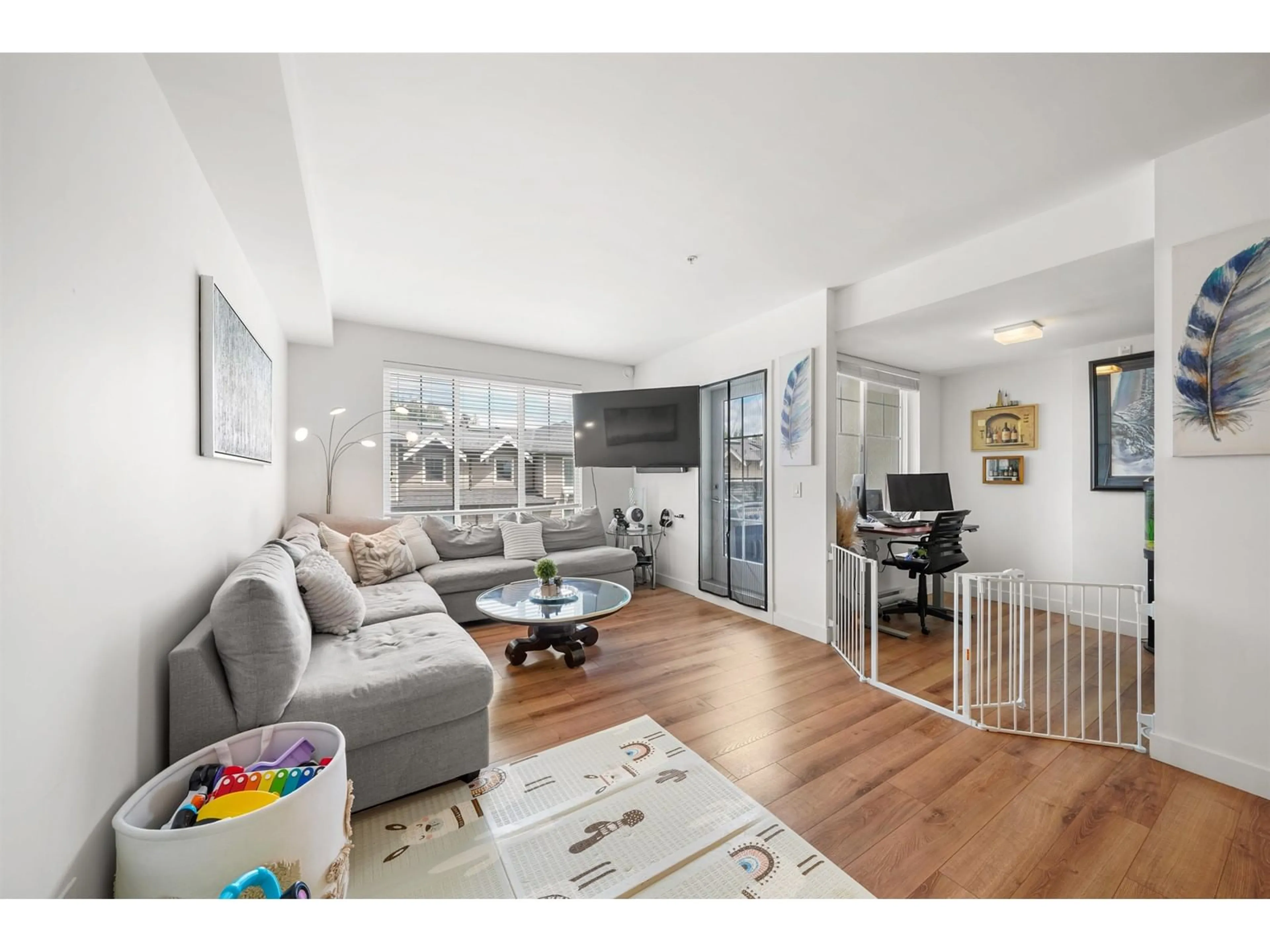 Living room, wood floors for A315 20487 65 AVENUE, Langley British Columbia V2Y3K5