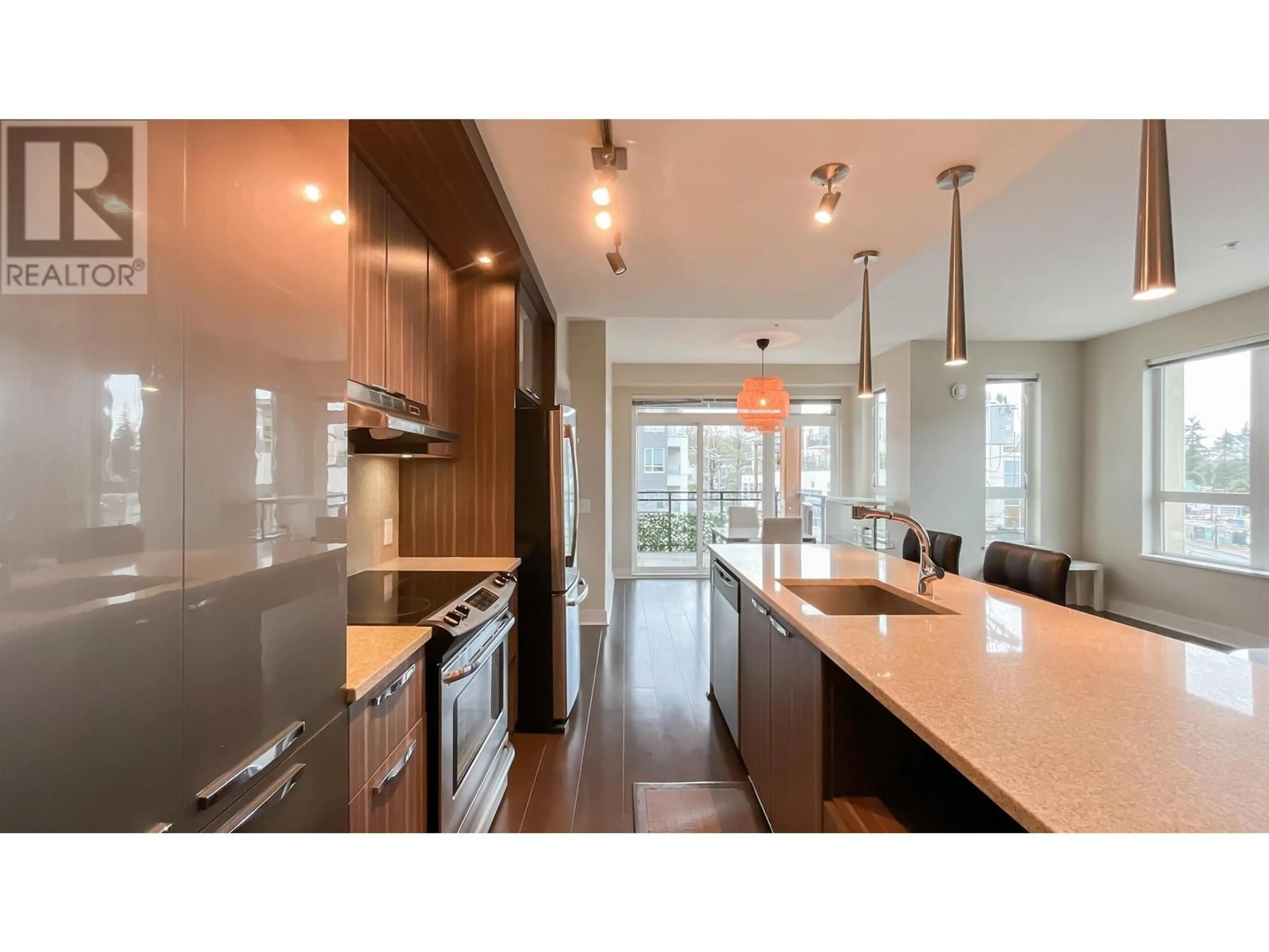 Contemporary kitchen, wood floors for 308 733 W 14TH STREET, North Vancouver British Columbia V7M0C6