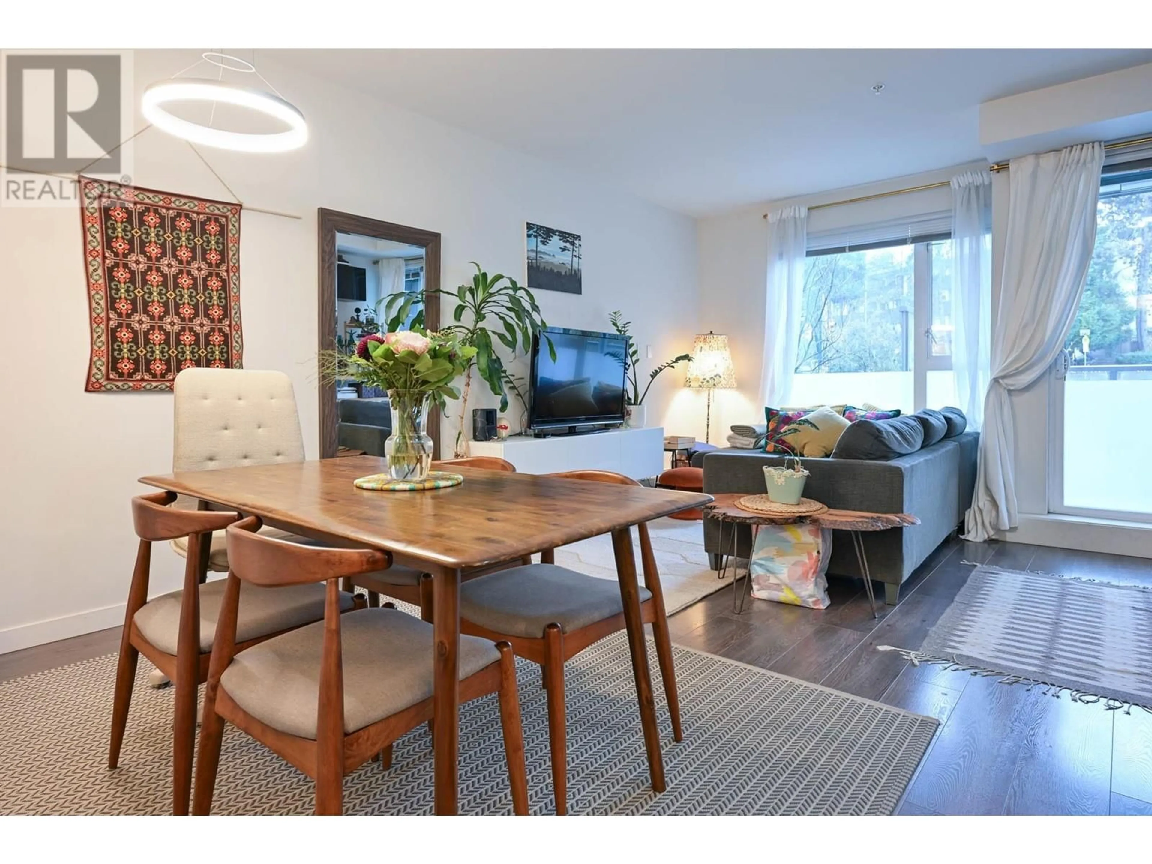 Dining room, wood floors for 303 417 GREAT NORTHERN WAY, Vancouver British Columbia V5T0G7