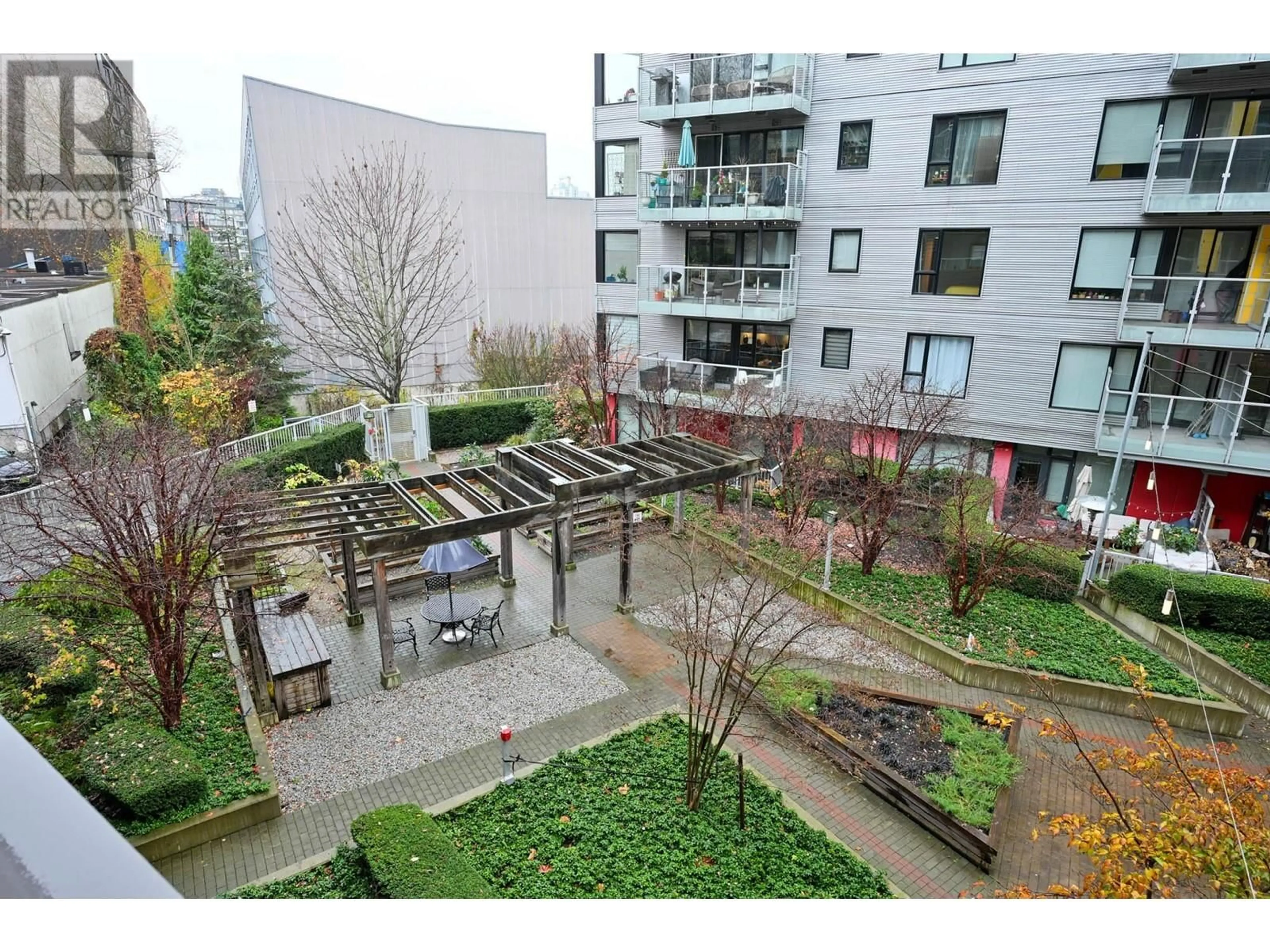 Patio, the fenced backyard for 303 417 GREAT NORTHERN WAY, Vancouver British Columbia V5T0G7