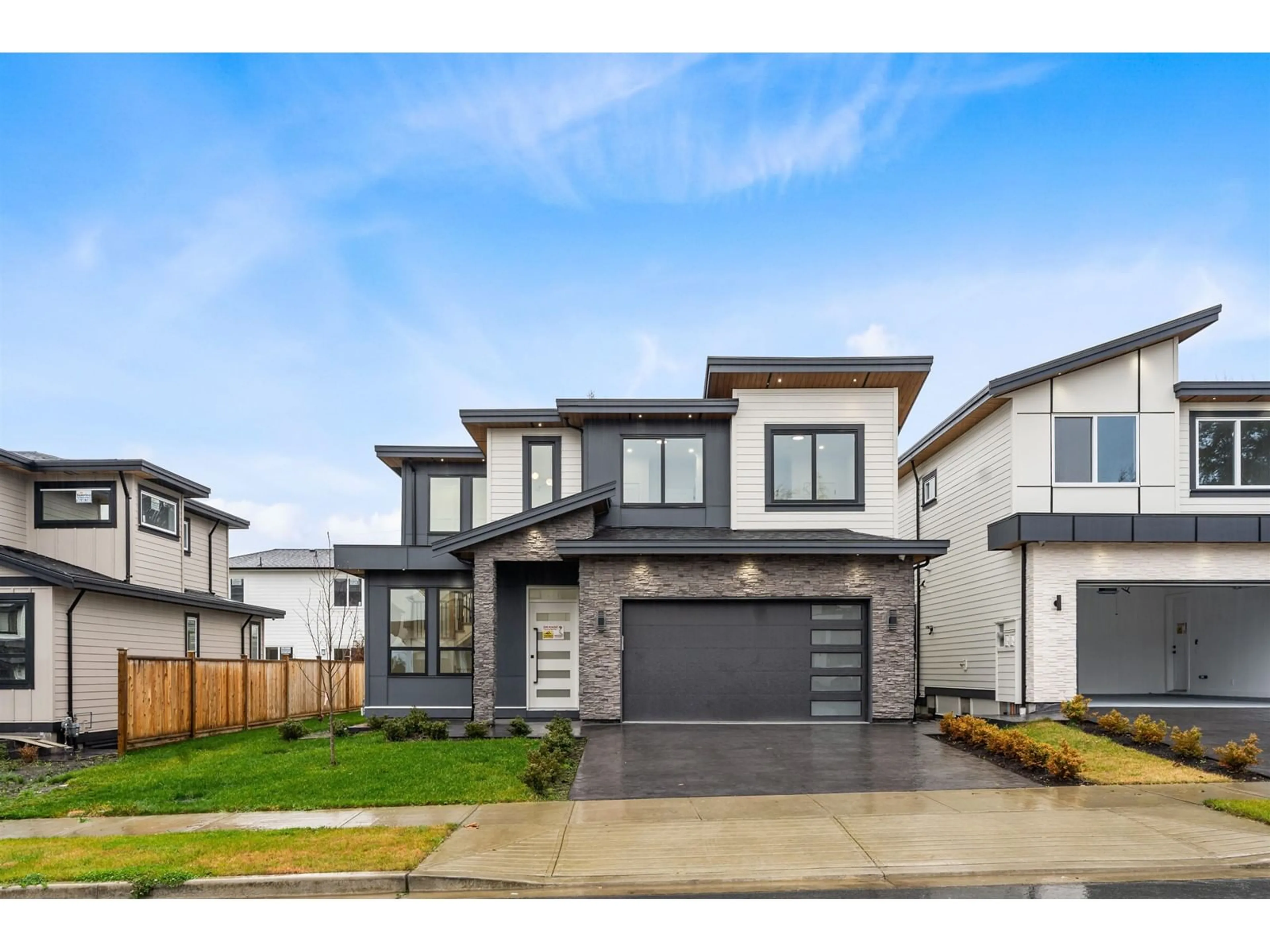 Frontside or backside of a home, the fenced backyard for 7137 204A STREET, Langley British Columbia V2Y3S7