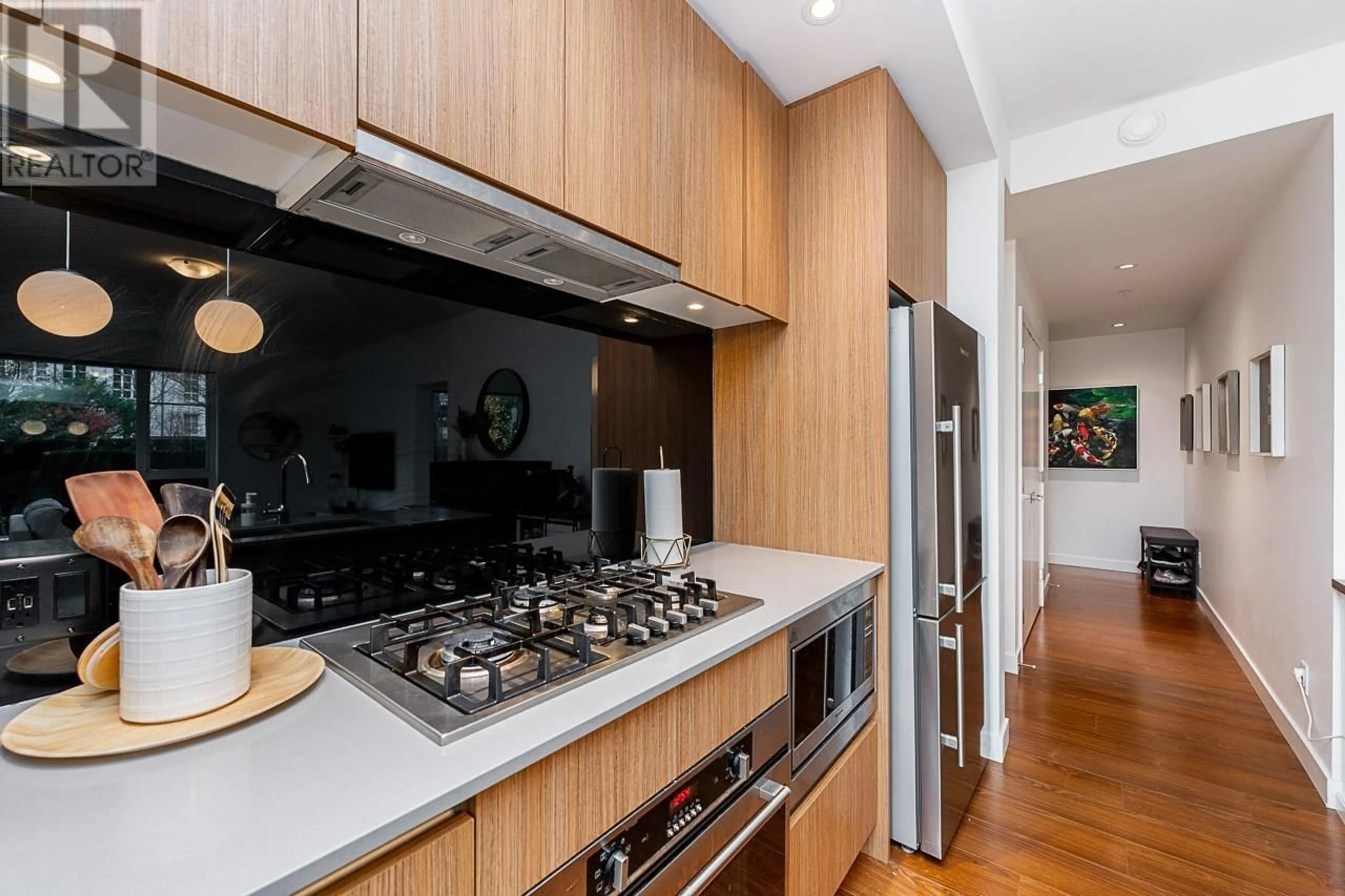 Contemporary kitchen, wood floors for 104 516 FOSTER AVENUE, Coquitlam British Columbia V3J0H8