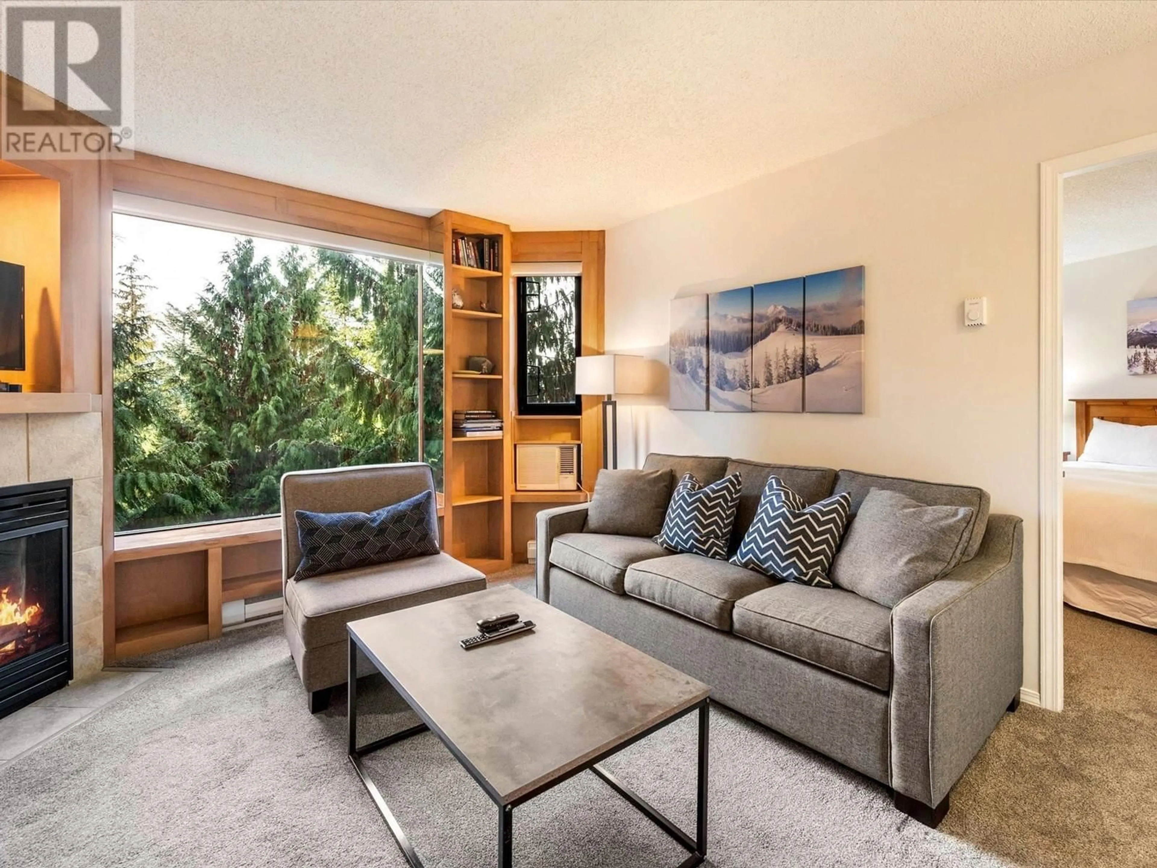 Living room, wood floors for 308 4809 SPEARHEAD DRIVE, Whistler British Columbia V0N1B4