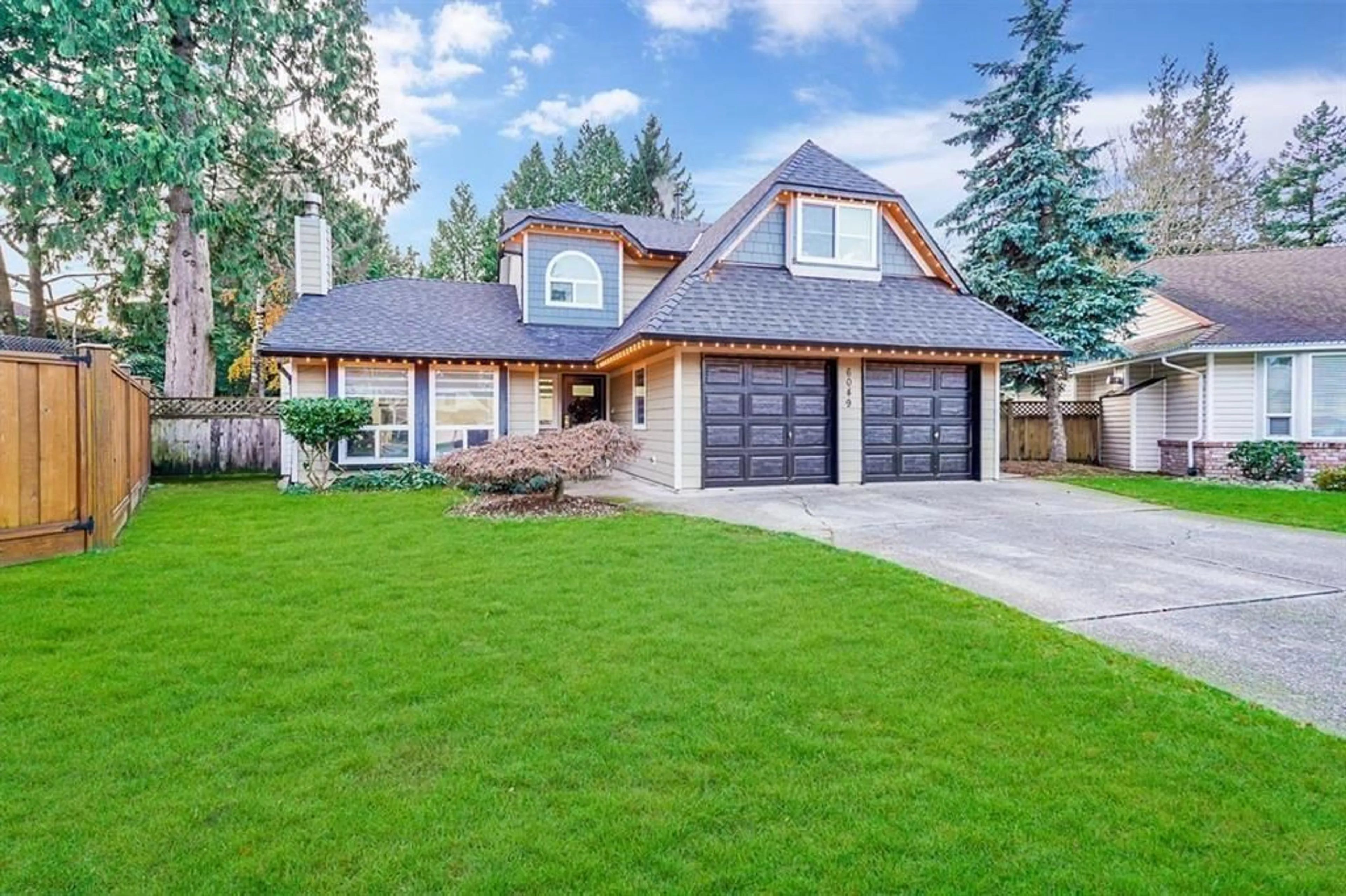 Home with vinyl exterior material, street for 6049 133A, Surrey British Columbia V3X2K3