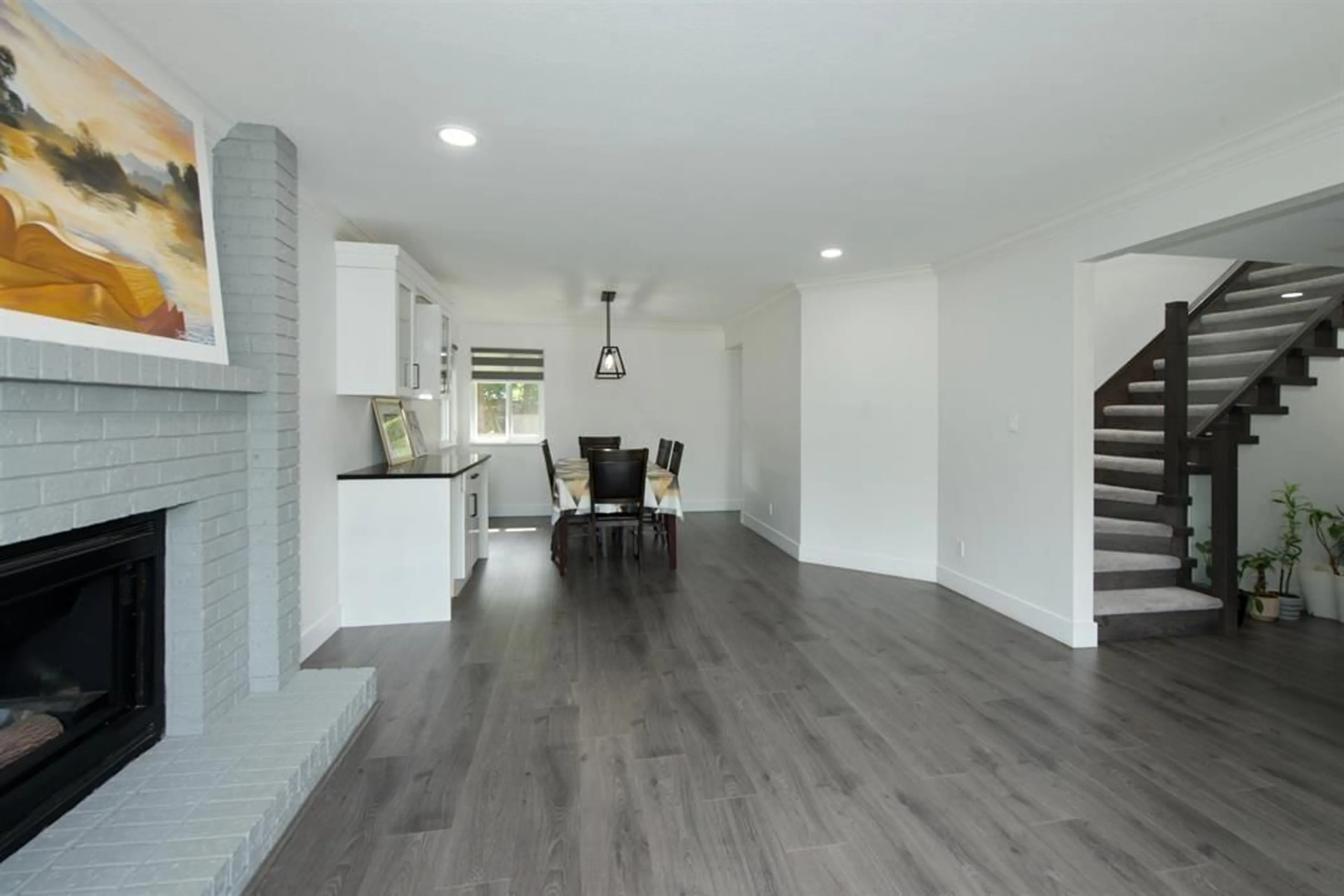 A pic of a room, wood floors for 6049 133A STREET, Surrey British Columbia V3X2K3