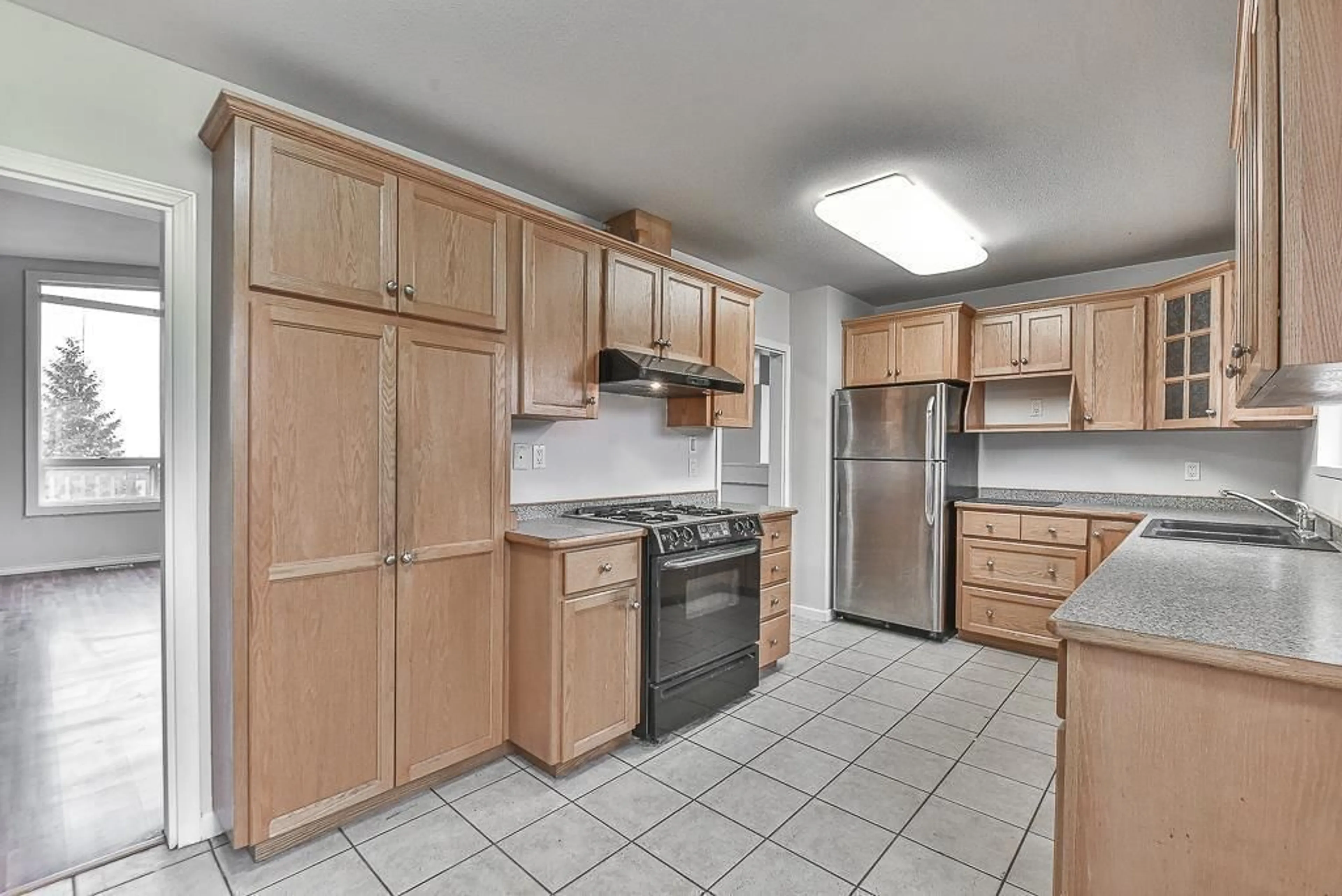 Standard kitchen, wood floors for 32976 12TH AVENUE, Mission British Columbia V2V2M8