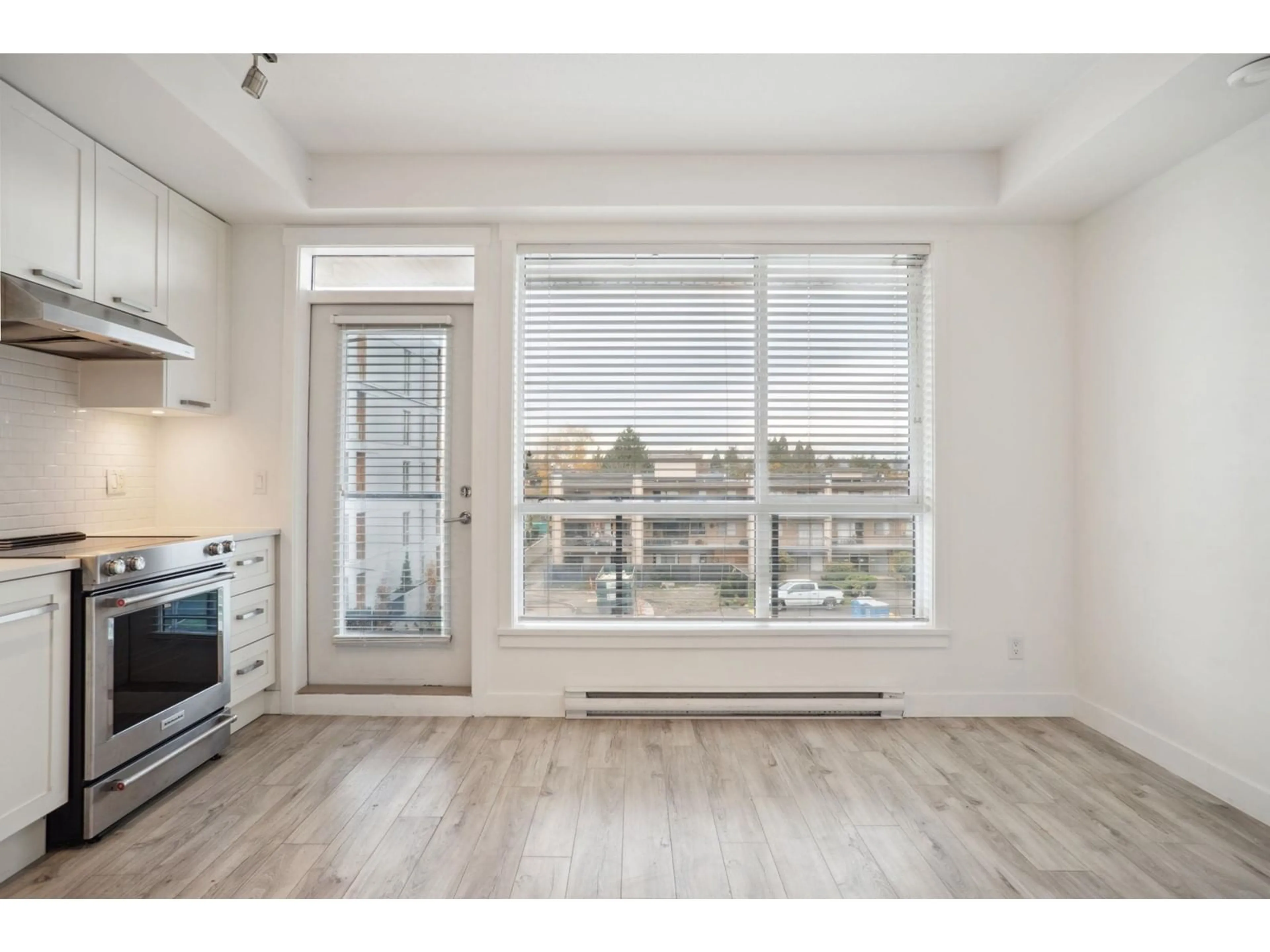 A pic of a room, wood floors for 318 5638 201A STREET, Langley British Columbia V3A0L8