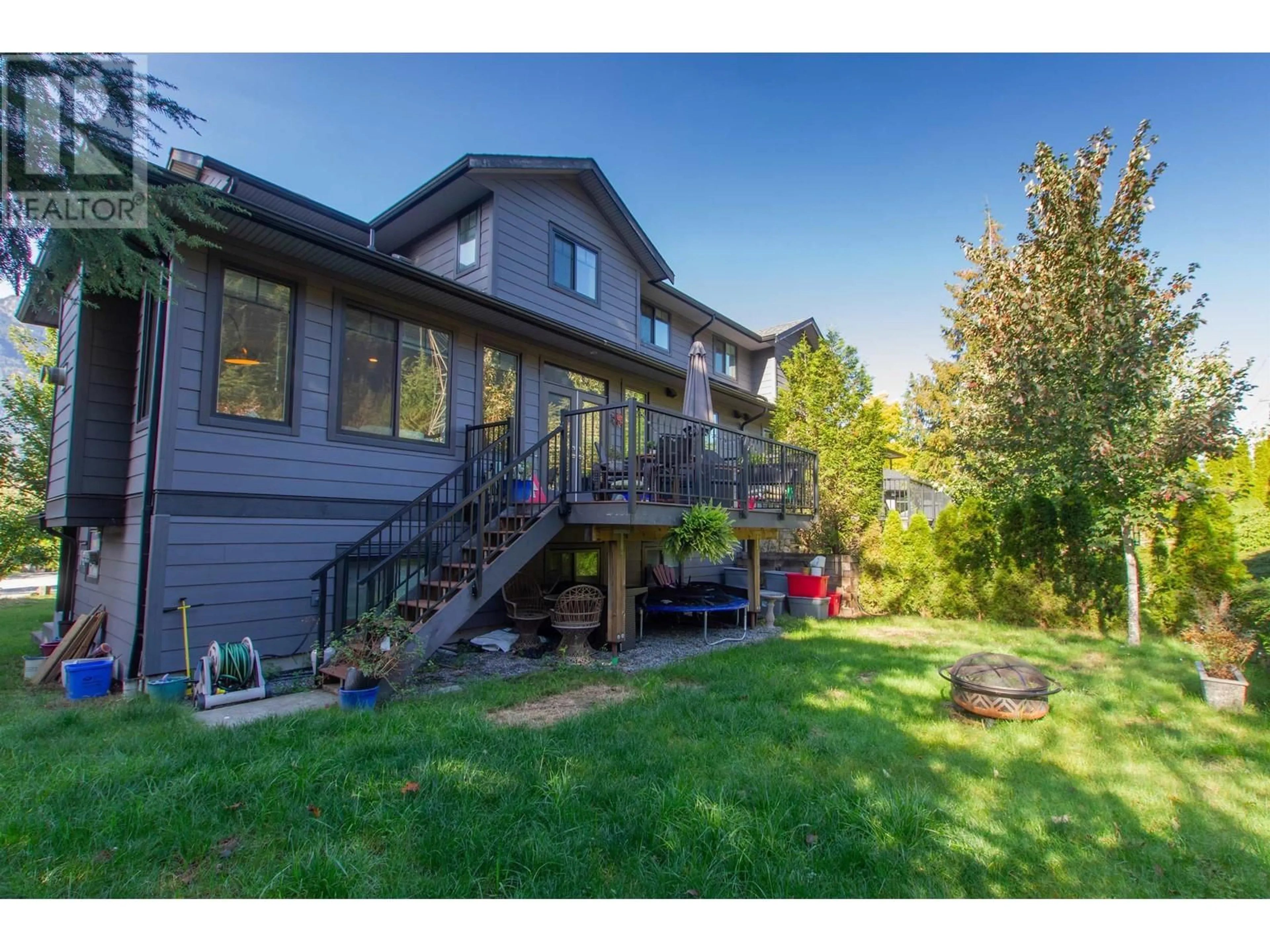 Frontside or backside of a home, the fenced backyard for 41740 HONEY LANE, Squamish British Columbia V0N1H0