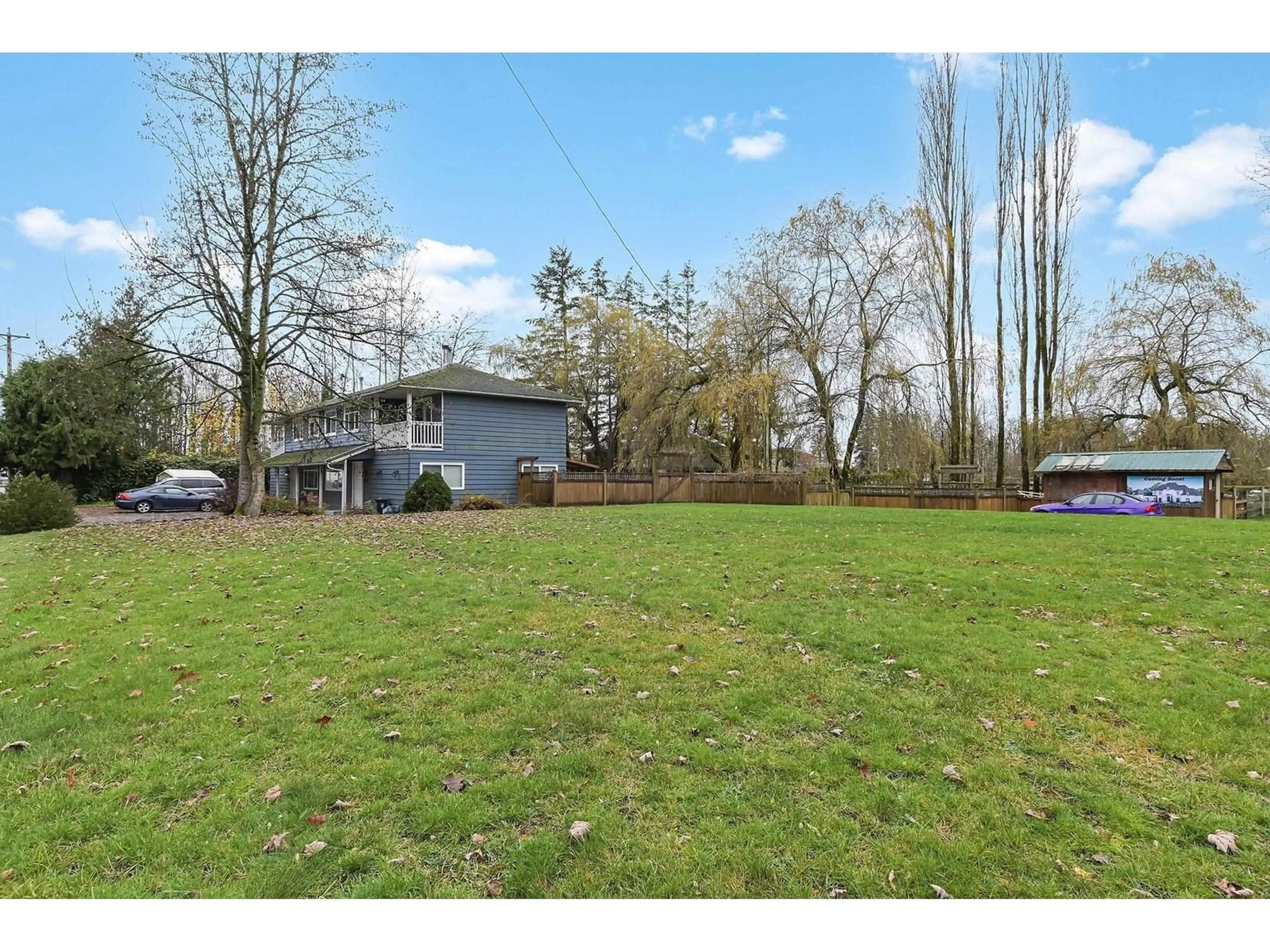 Frontside or backside of a home, the fenced backyard for 5831 216 STREET, Langley British Columbia V2Y2N5