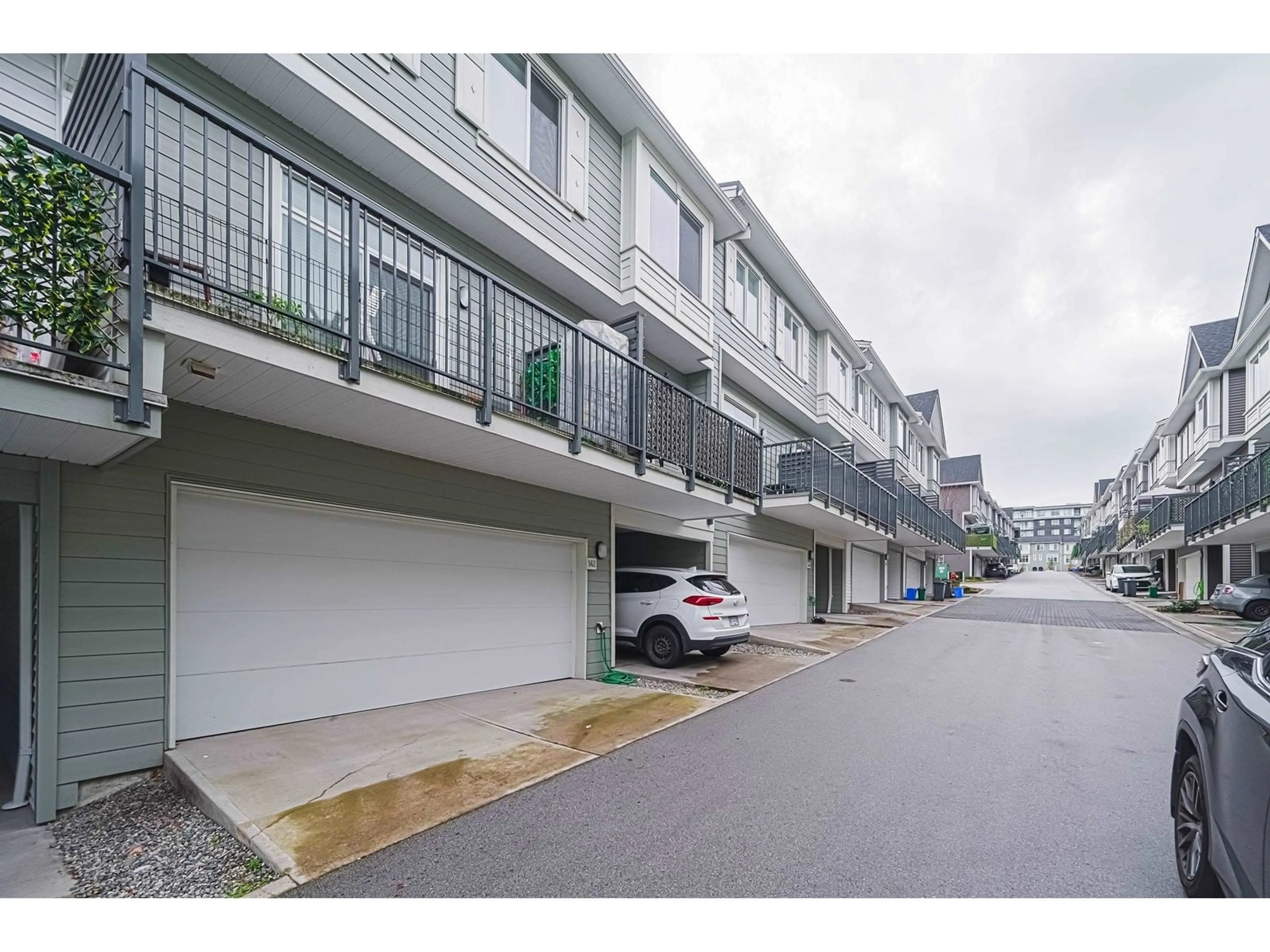 A pic from exterior of the house or condo, the street view for 142 8168 136A STREET, Surrey British Columbia V3W2Z6