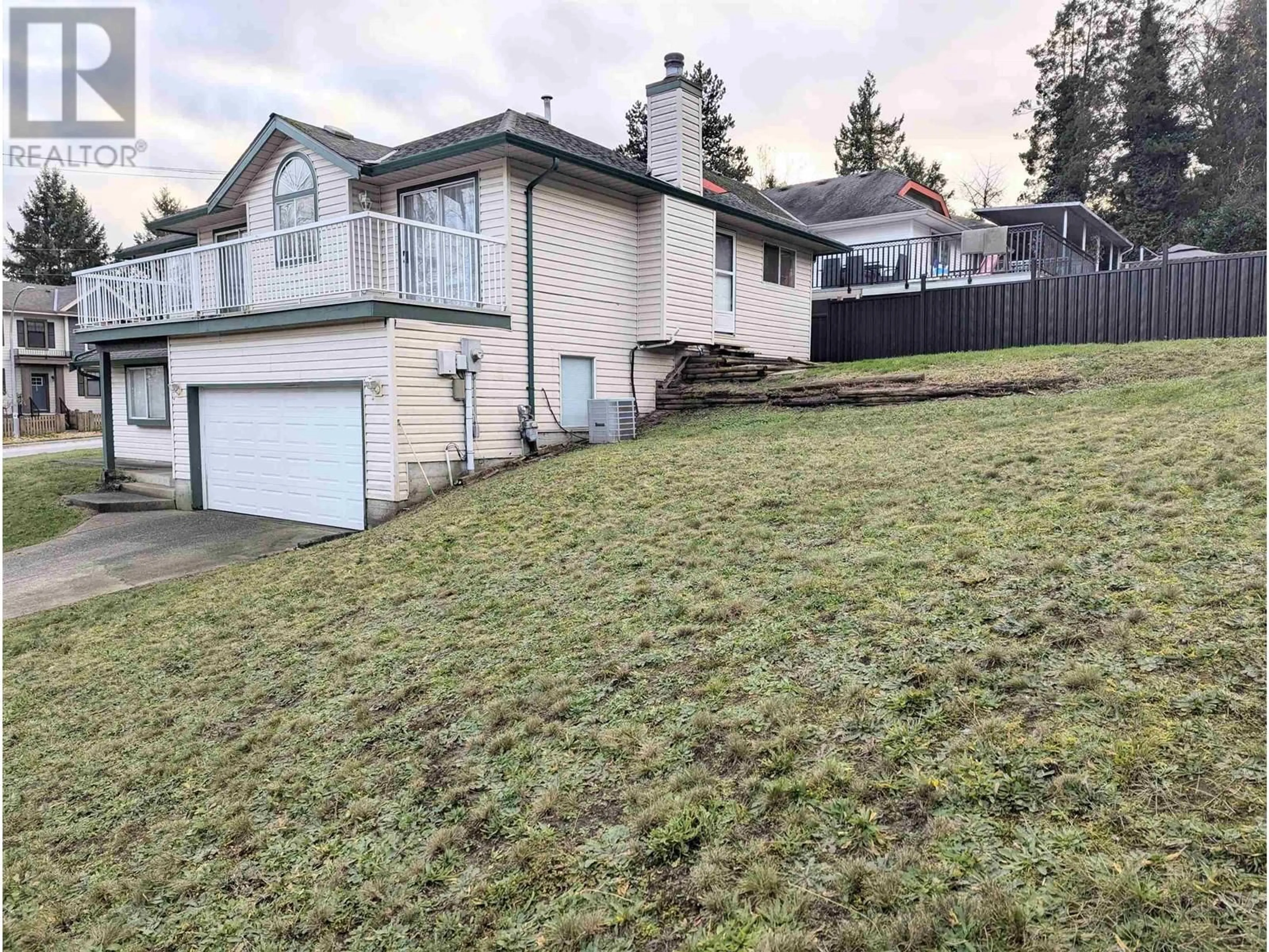 Frontside or backside of a home, the fenced backyard for 1216 BRAND STREET, Port Coquitlam British Columbia V3C5C4